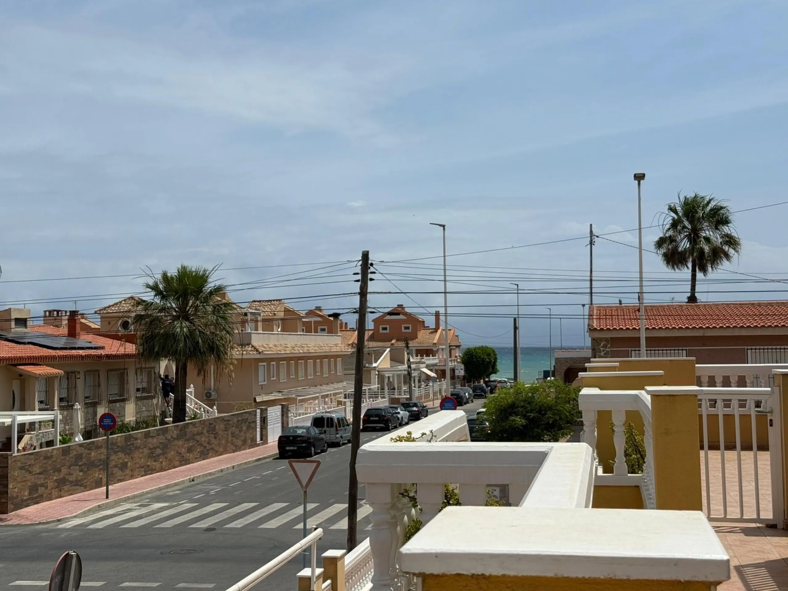 Spacious 4-bedroom apartment in La Mata with sea views, private solarium, and parking space