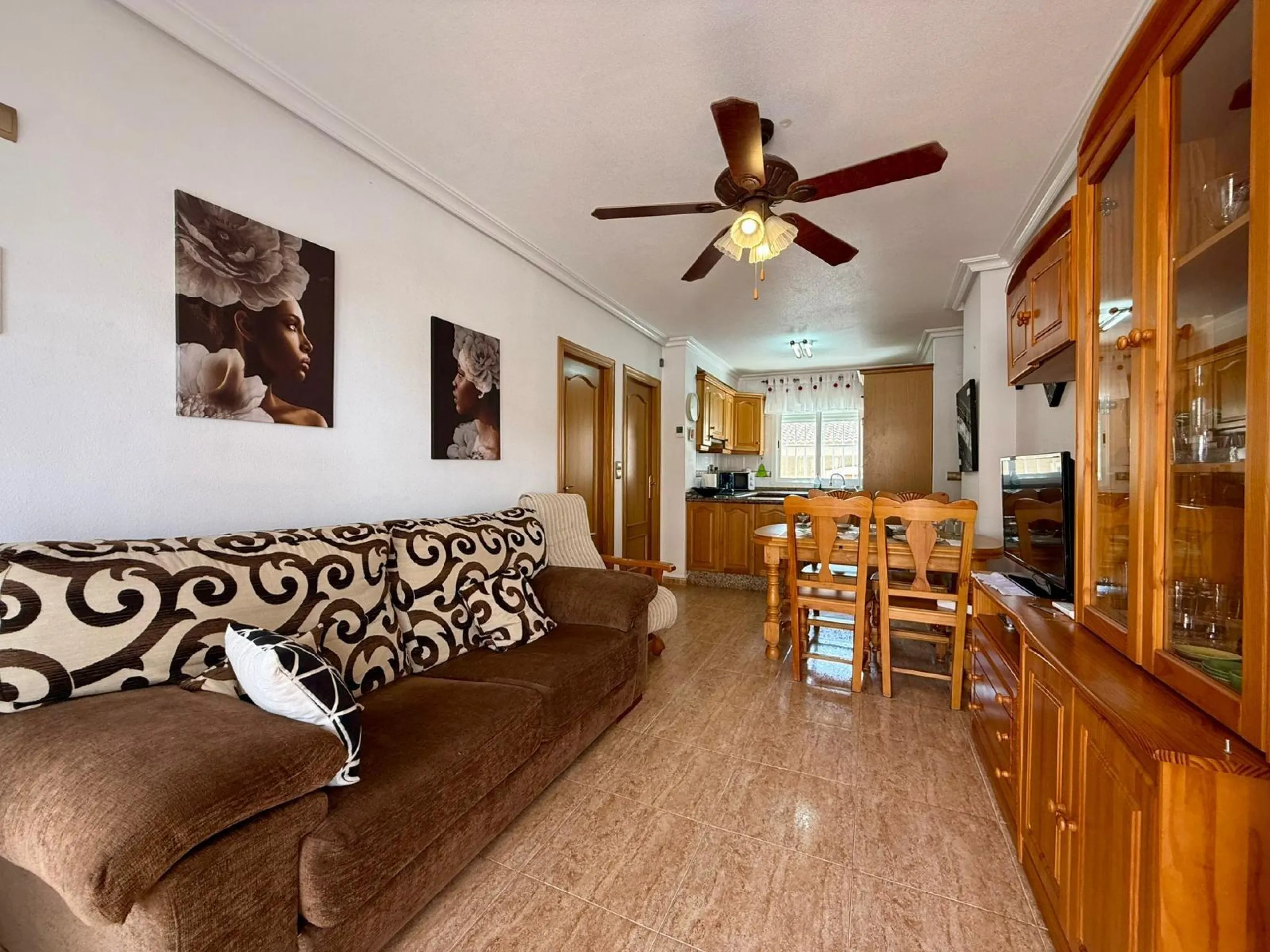 Spacious 4-bedroom apartment in La Mata with sea views, private solarium, and parking space