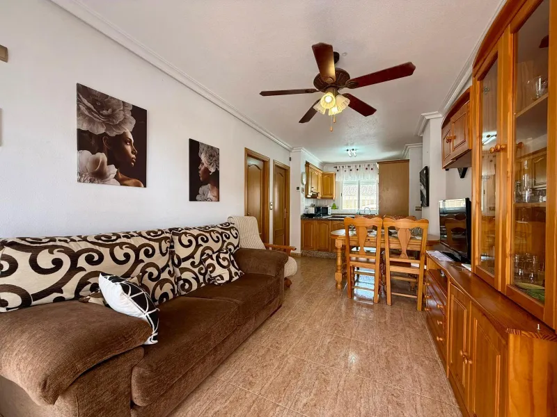 Spacious 4-bedroom apartment in La Mata with sea views, private solarium, and parking space