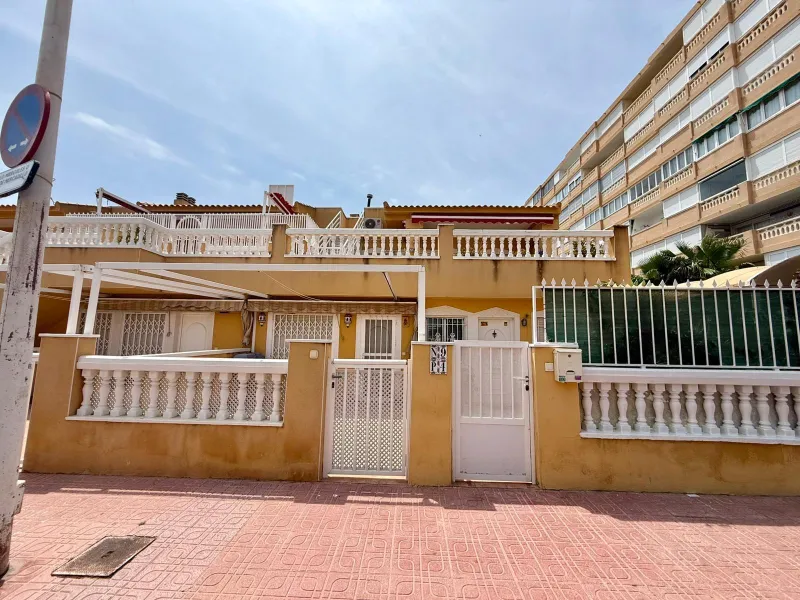 Spacious 4-bedroom apartment in La Mata with sea views, private solarium, and parking space