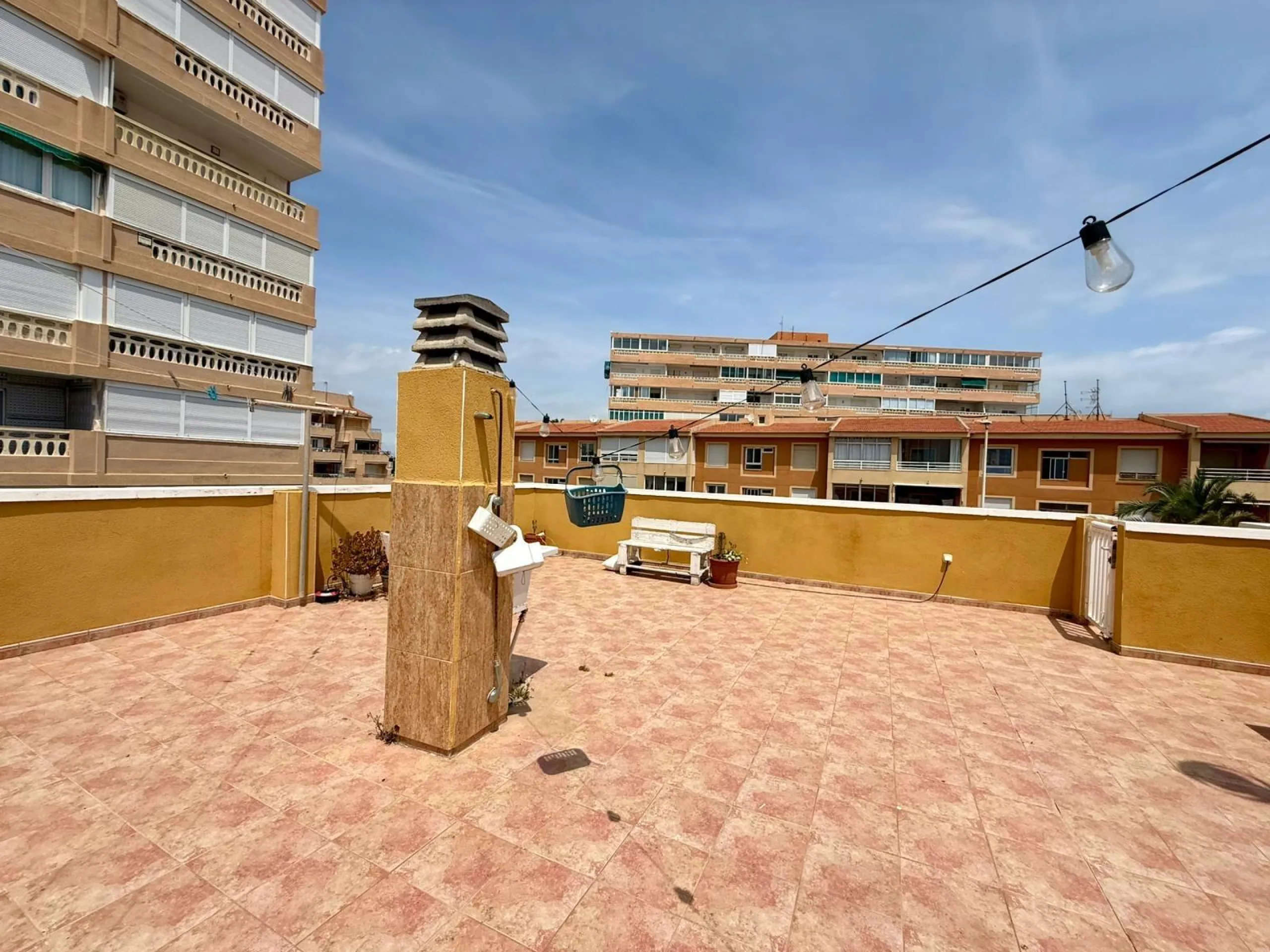 Spacious 4-bedroom apartment in La Mata with sea views, private solarium, and parking space
