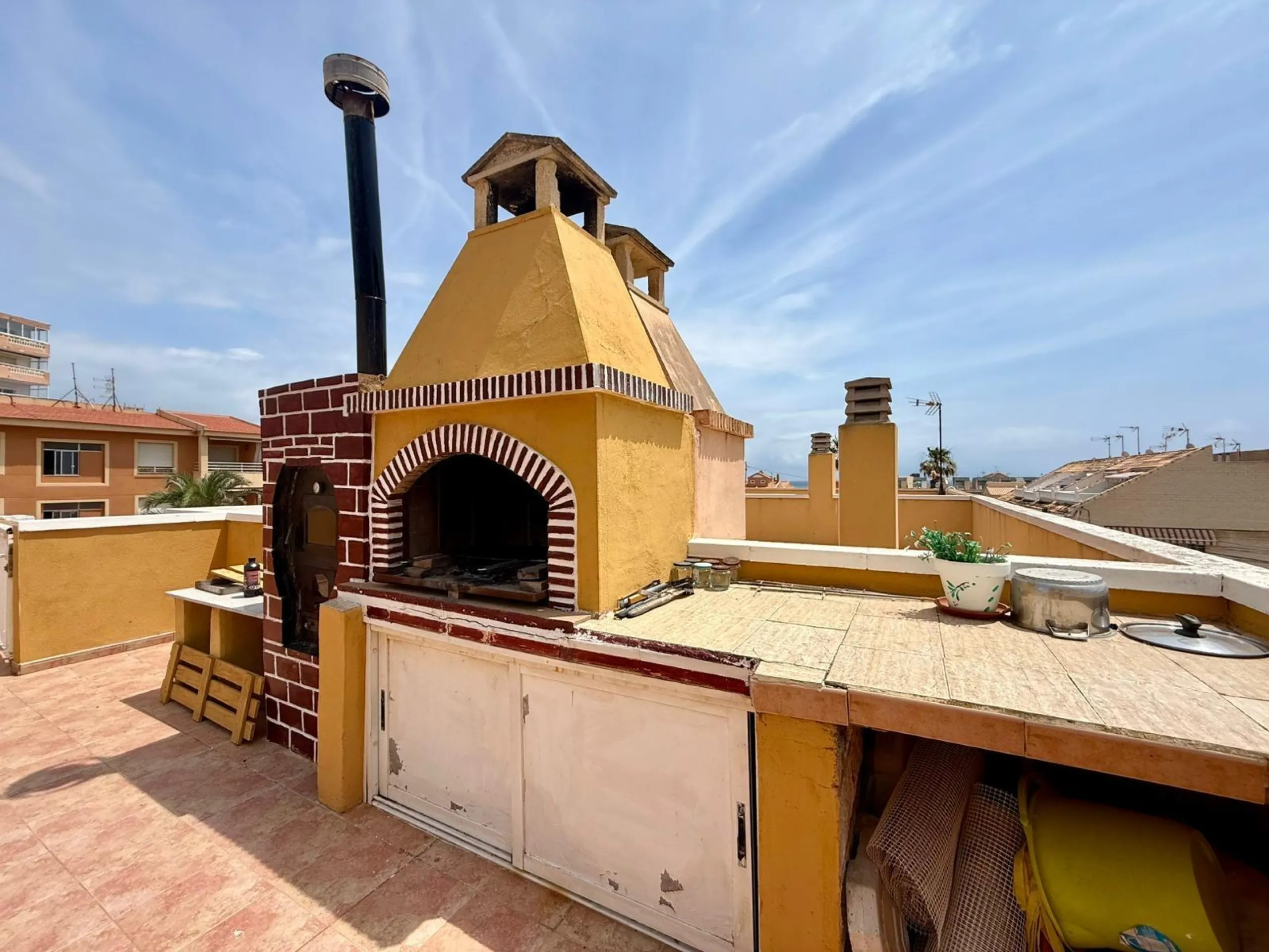 Spacious 4-bedroom apartment in La Mata with sea views, private solarium, and parking space