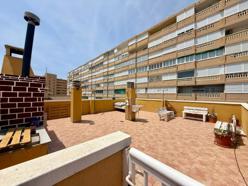 Spacious 4-bedroom apartment in La Mata with sea views, private solarium, and parking space