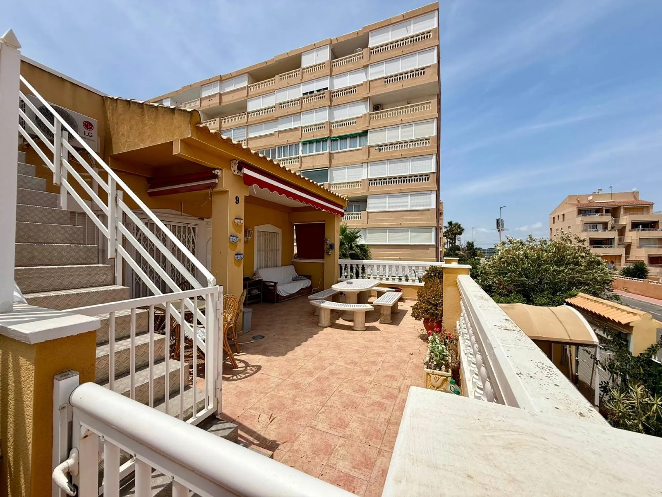 Spacious 4-bedroom apartment in La Mata with sea views, private solarium, and parking space