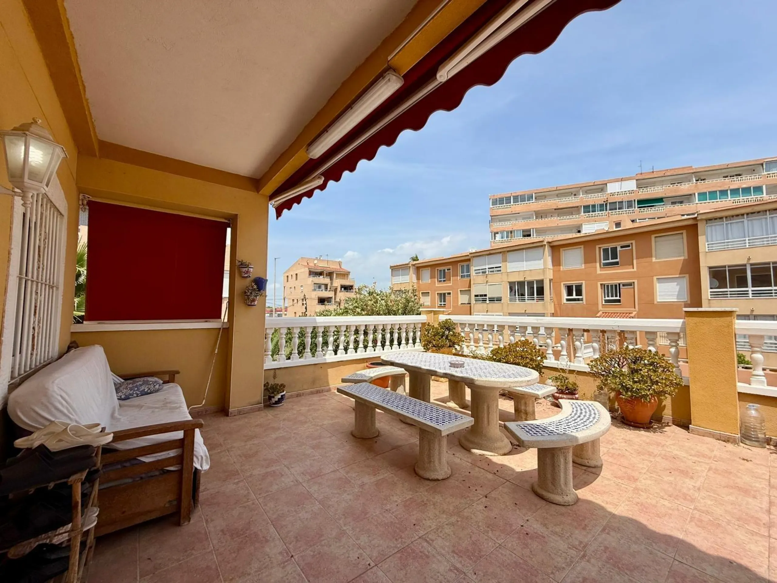 Spacious 4-bedroom apartment in La Mata with sea views, private solarium, and parking space