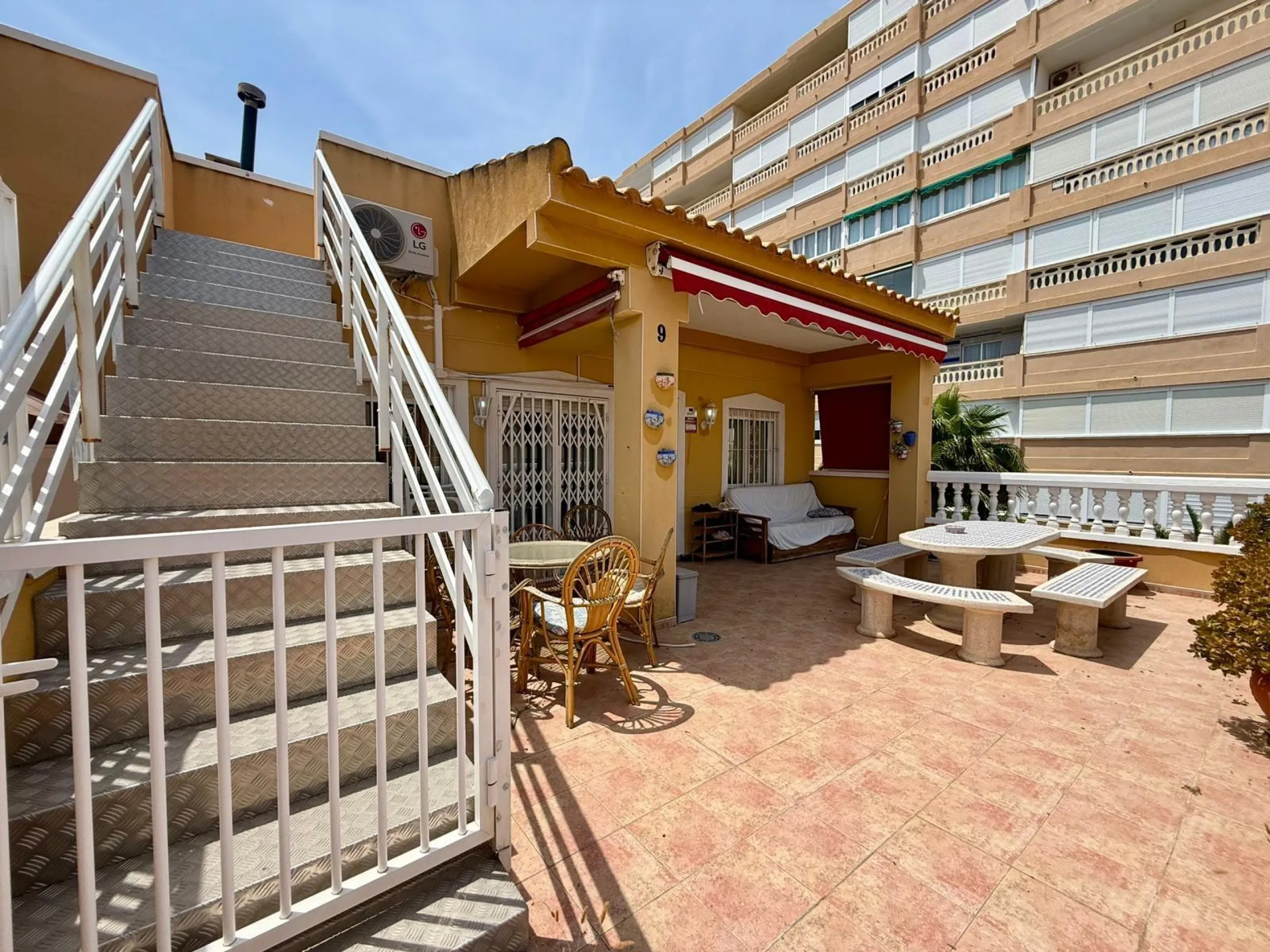 Spacious 4-bedroom apartment in La Mata with sea views, private solarium, and parking space
