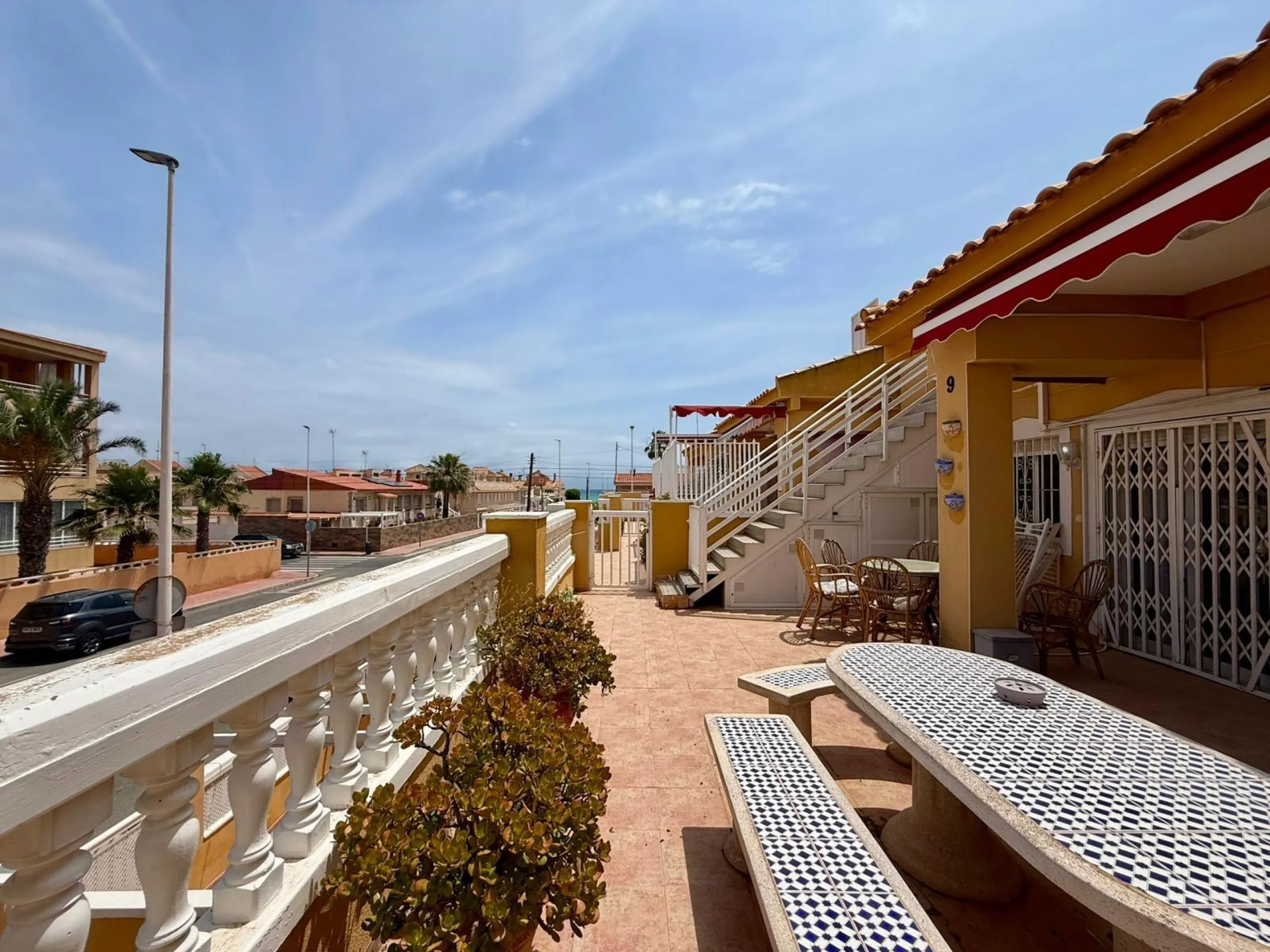 Spacious 4-bedroom apartment in La Mata with sea views, private solarium, and parking space