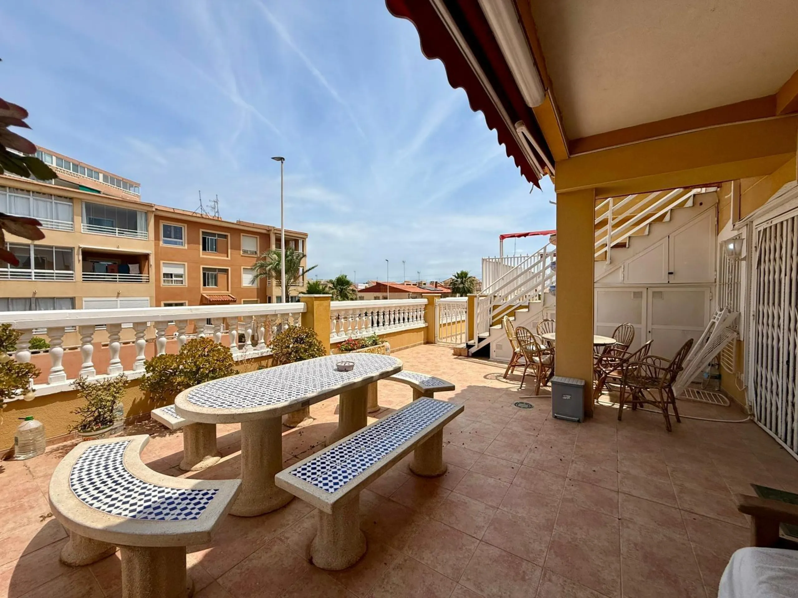 Spacious 4-bedroom apartment in La Mata with sea views, private solarium, and parking space