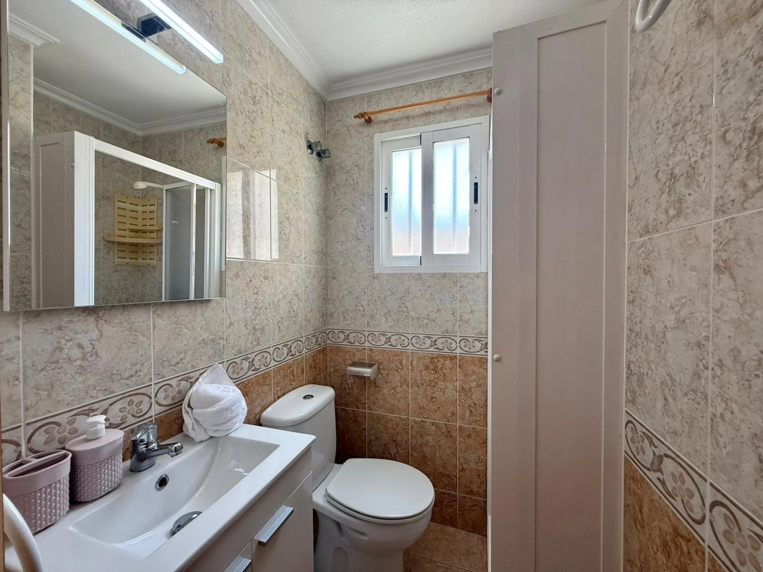 Spacious 4-bedroom apartment in La Mata with sea views, private solarium, and parking space