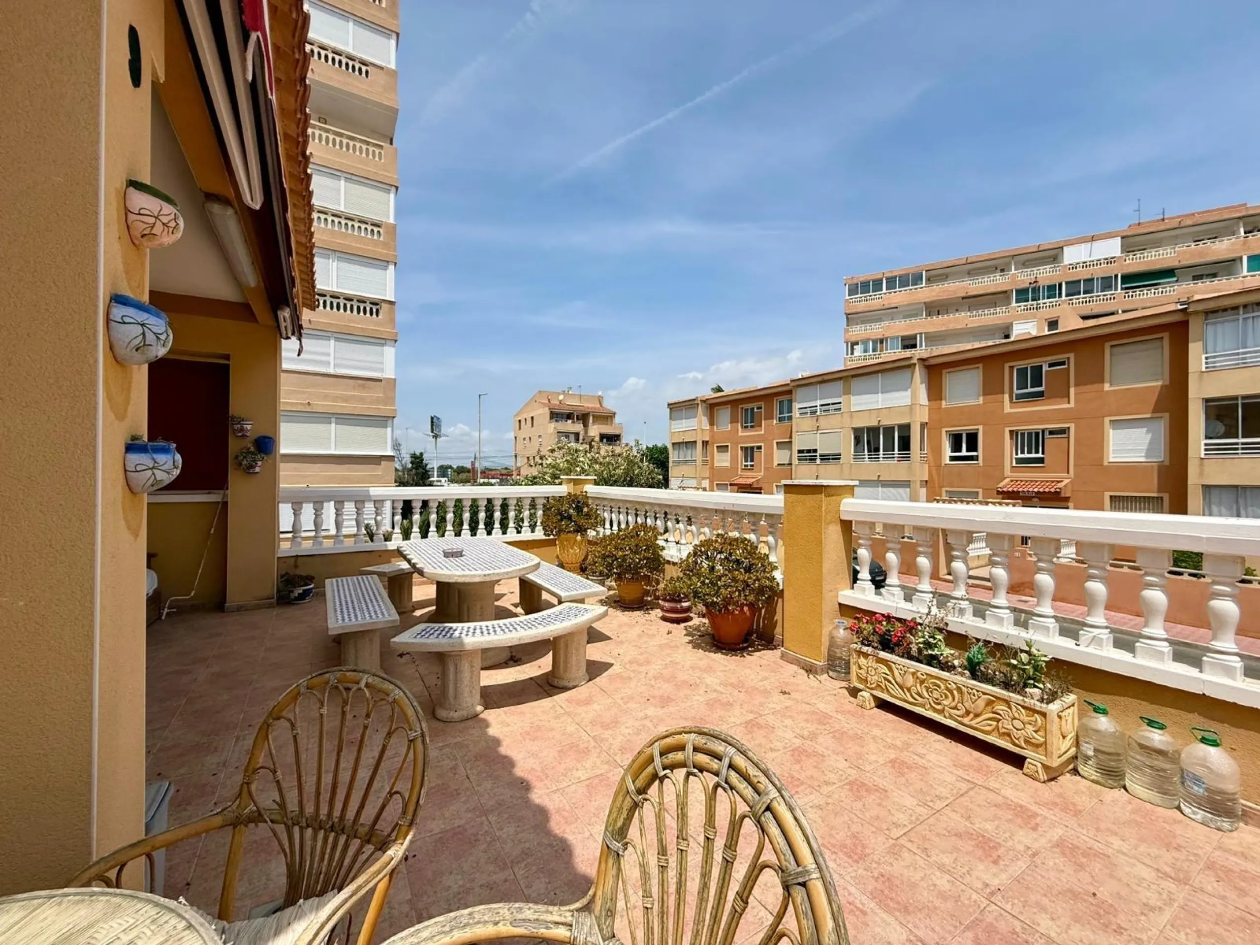 Spacious 4-bedroom apartment in La Mata with sea views, private solarium, and parking space