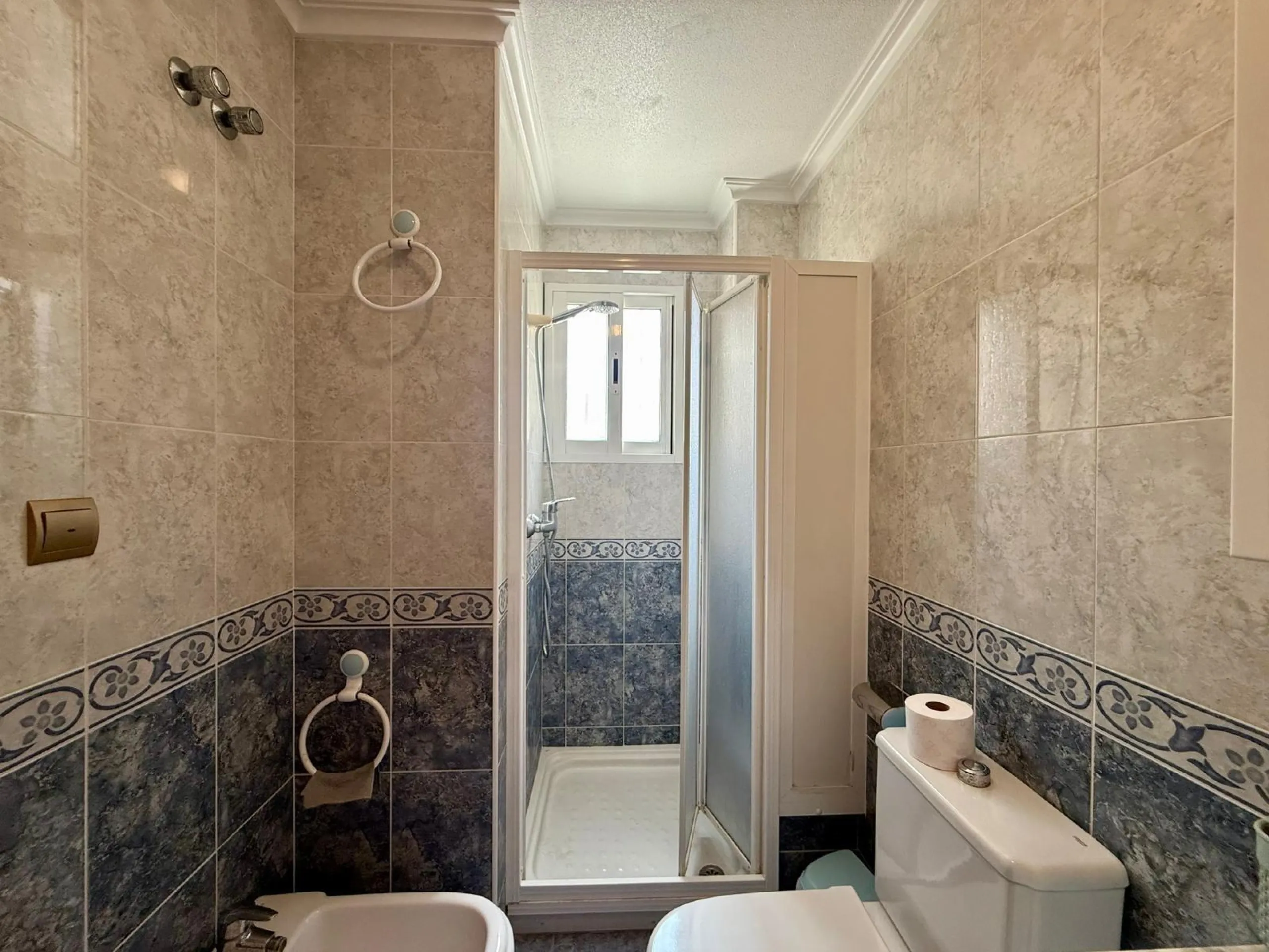 Spacious 4-bedroom apartment in La Mata with sea views, private solarium, and parking space