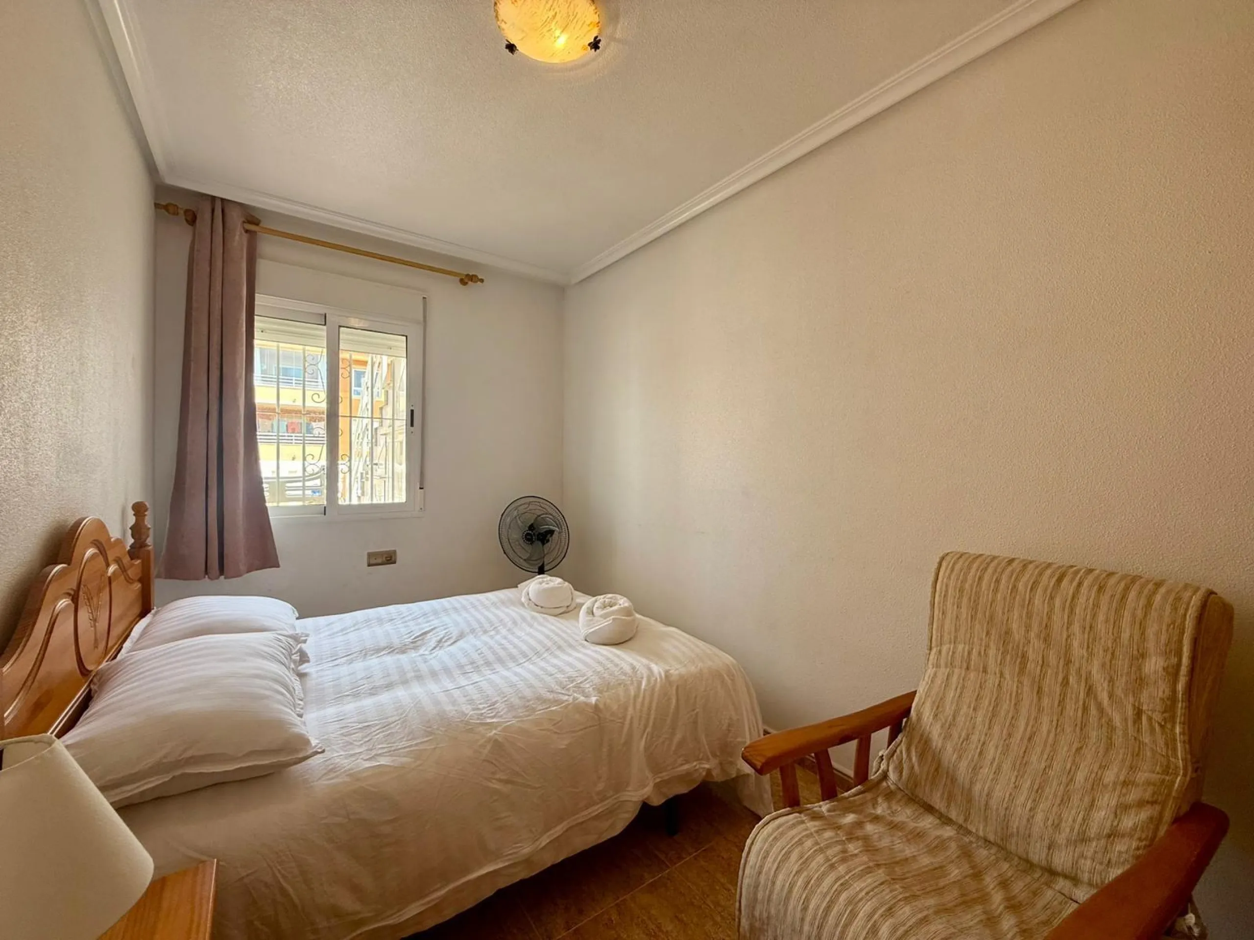 Spacious 4-bedroom apartment in La Mata with sea views, private solarium, and parking space