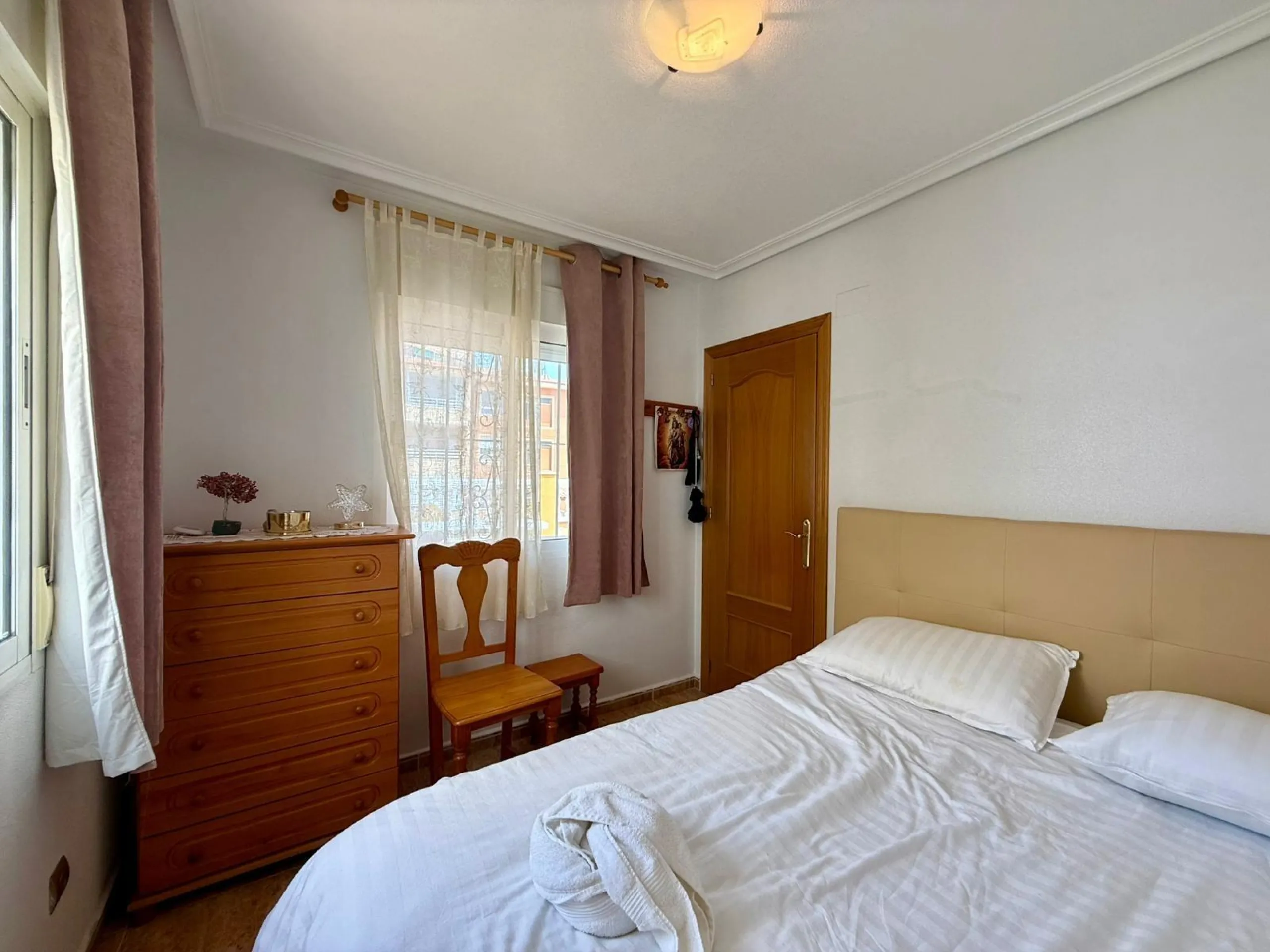 Spacious 4-bedroom apartment in La Mata with sea views, private solarium, and parking space