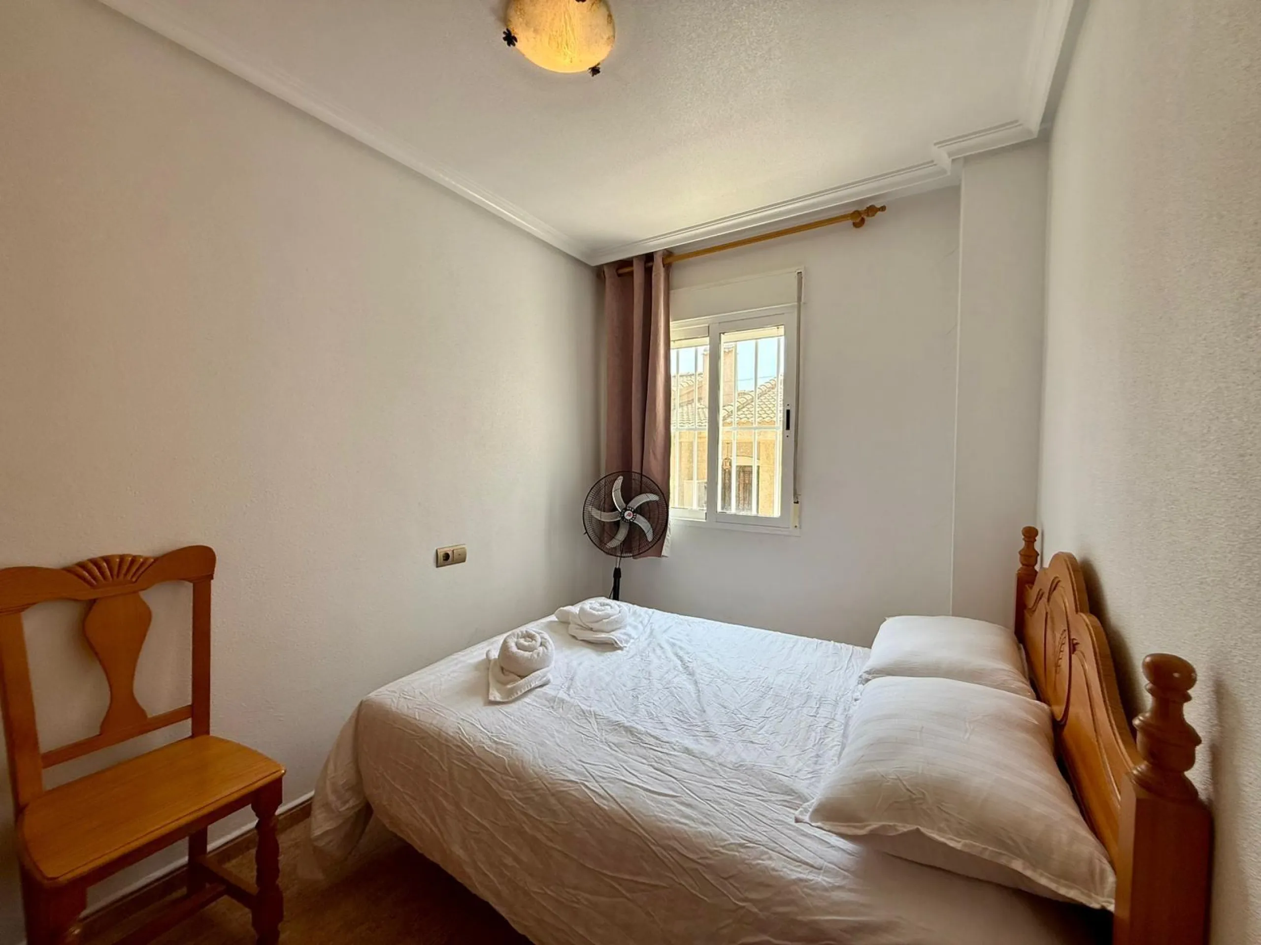 Spacious 4-bedroom apartment in La Mata with sea views, private solarium, and parking space