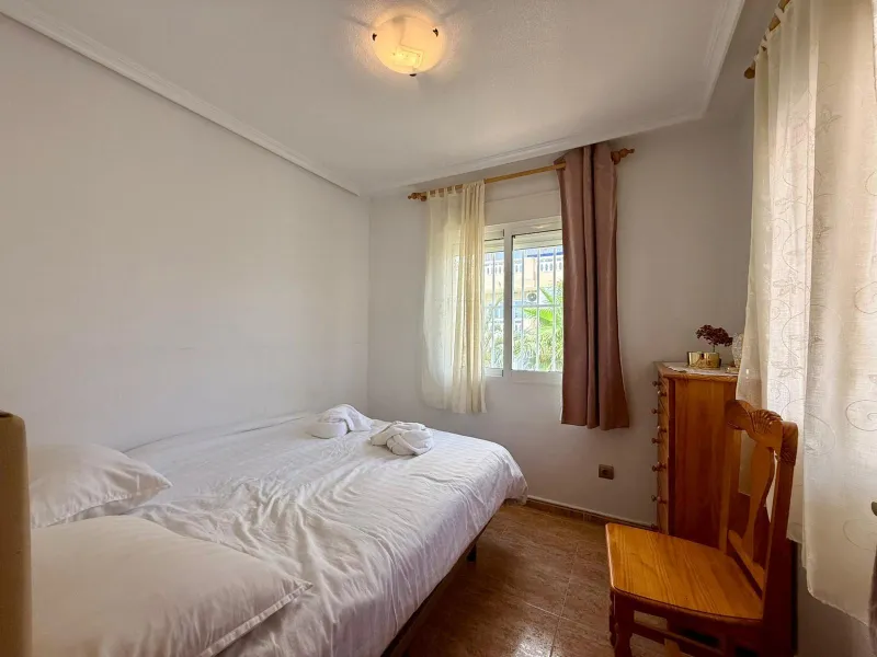 Spacious 4-bedroom apartment in La Mata with sea views, private solarium, and parking space
