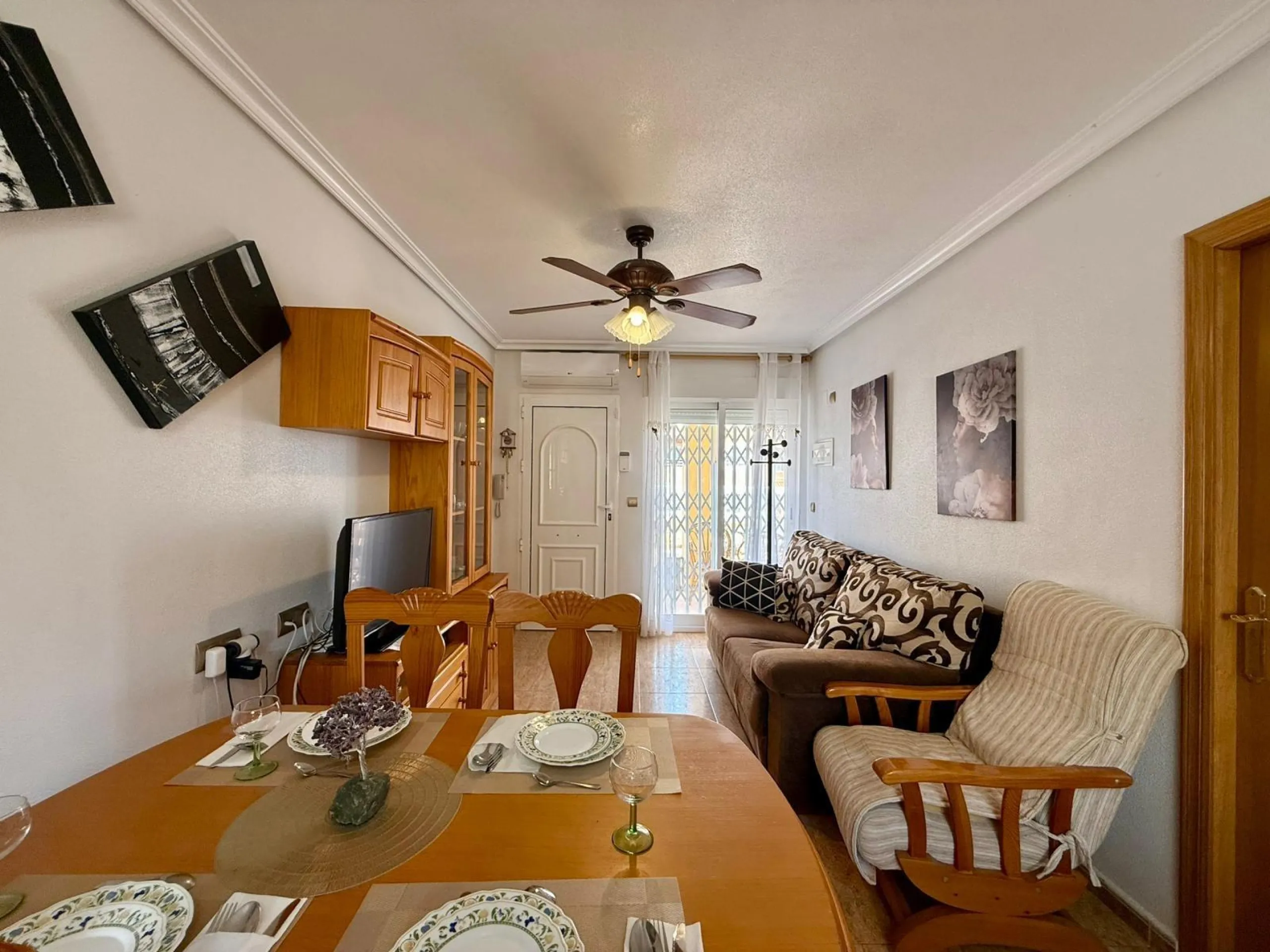 Spacious 4-bedroom apartment in La Mata with sea views, private solarium, and parking space