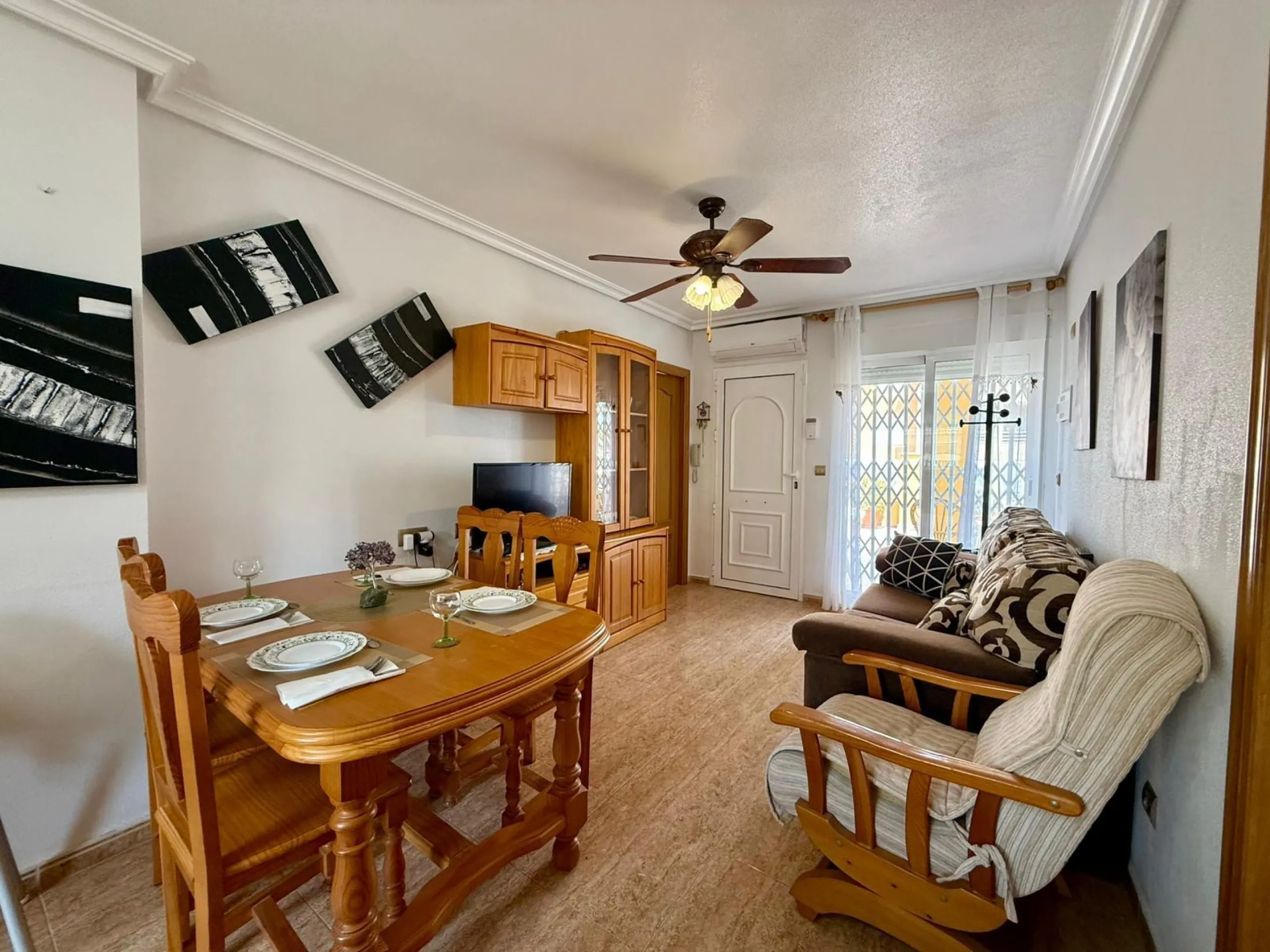 Spacious 4-bedroom apartment in La Mata with sea views, private solarium, and parking space