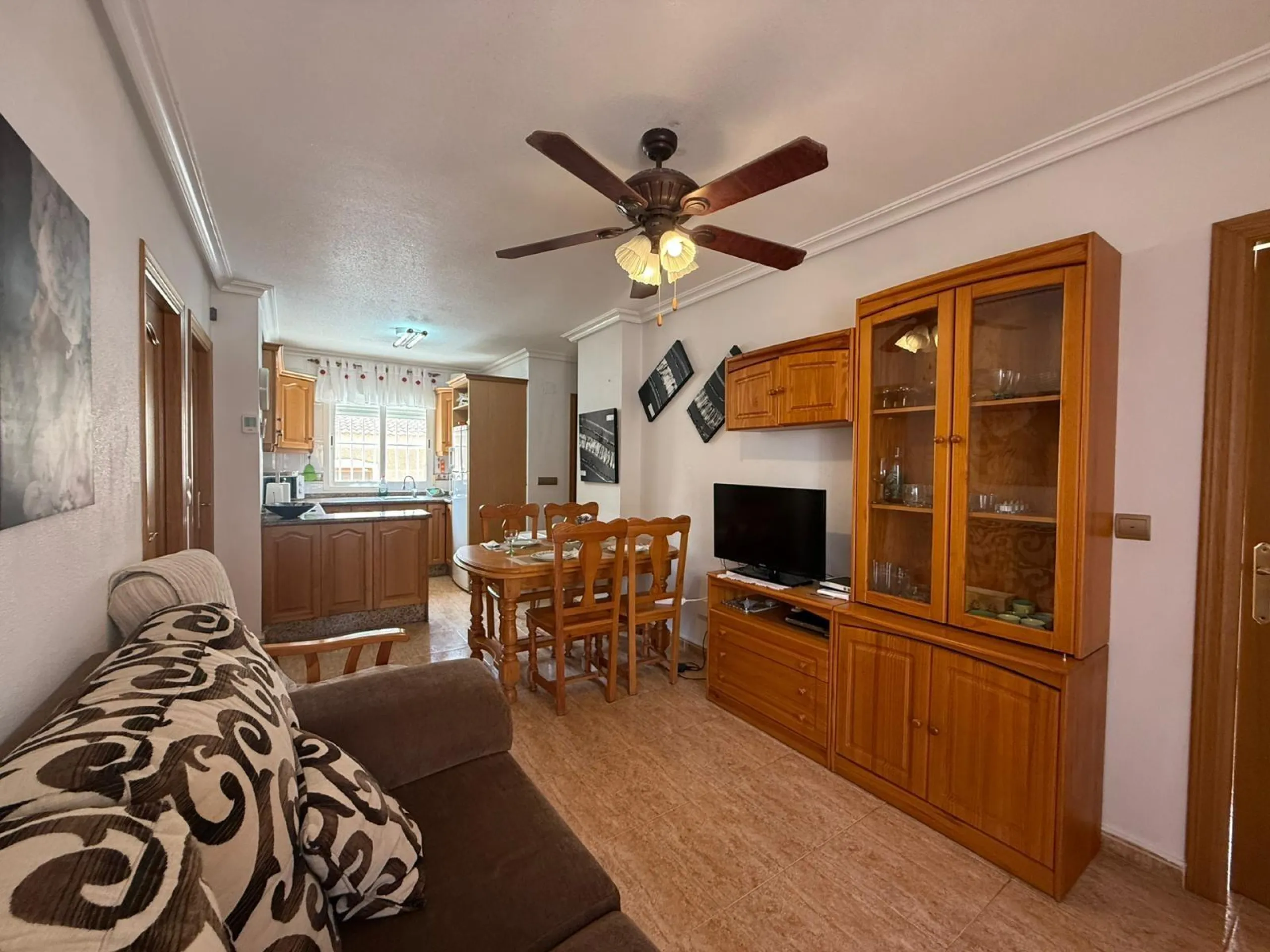 Spacious 4-bedroom apartment in La Mata with sea views, private solarium, and parking space