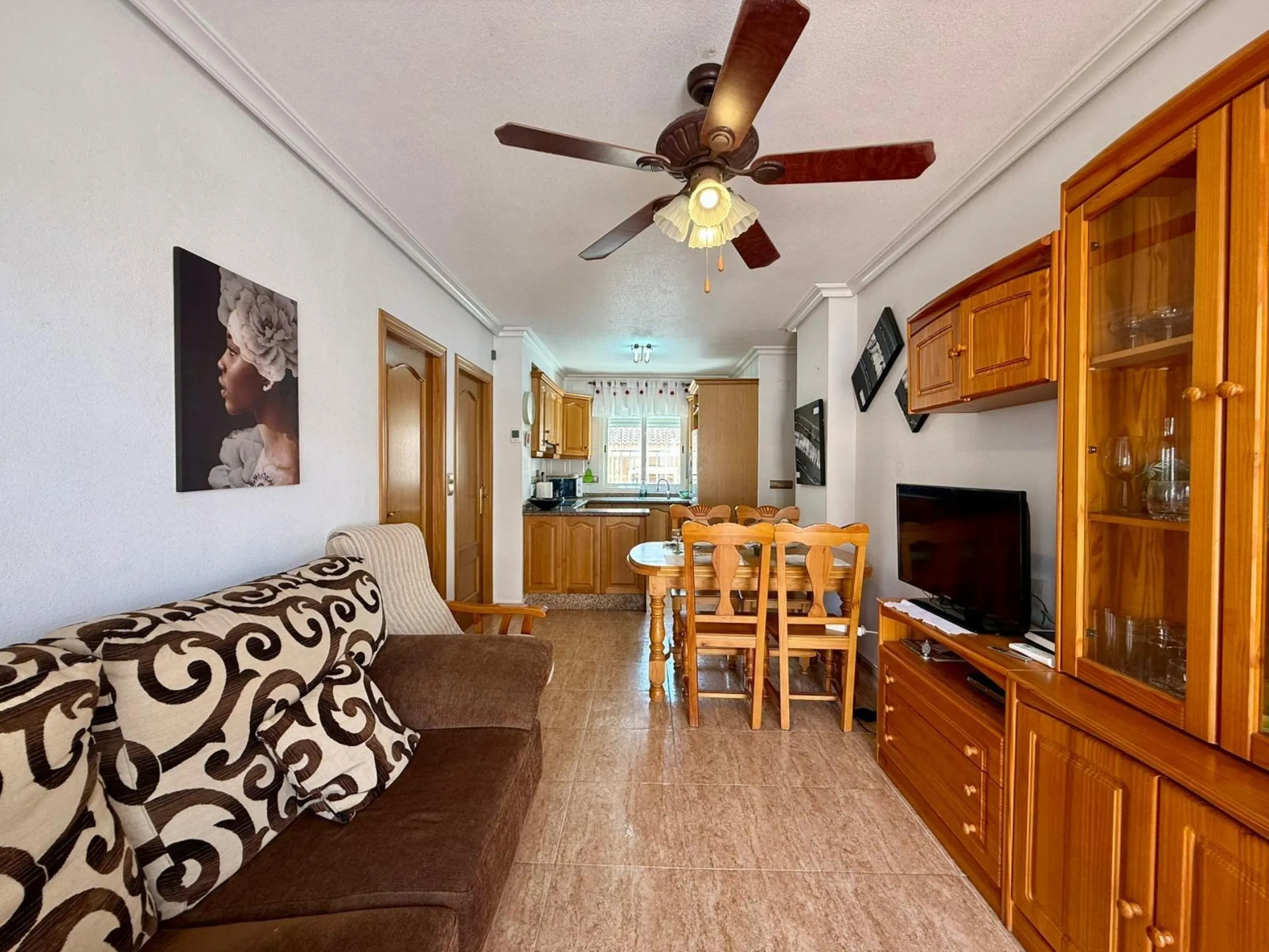 Spacious 4-bedroom apartment in La Mata with sea views, private solarium, and parking space