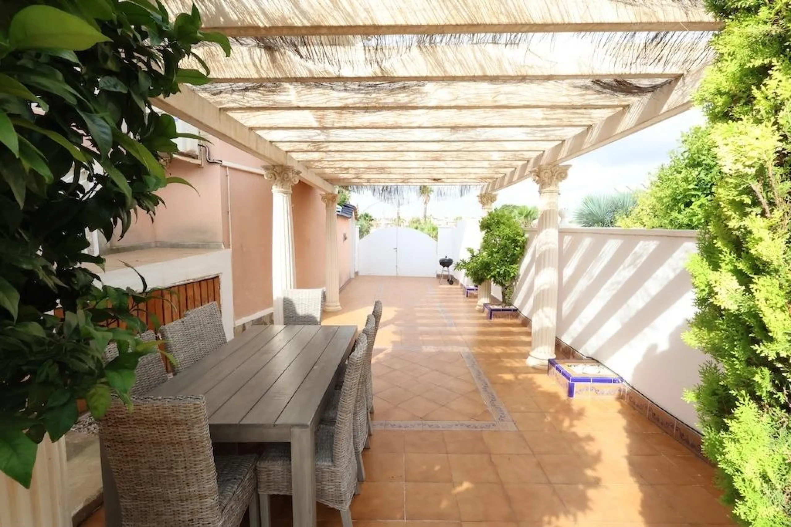 Ciudad Quesada, Residencial Elena – Corner townhouse directly facing the communal pool.