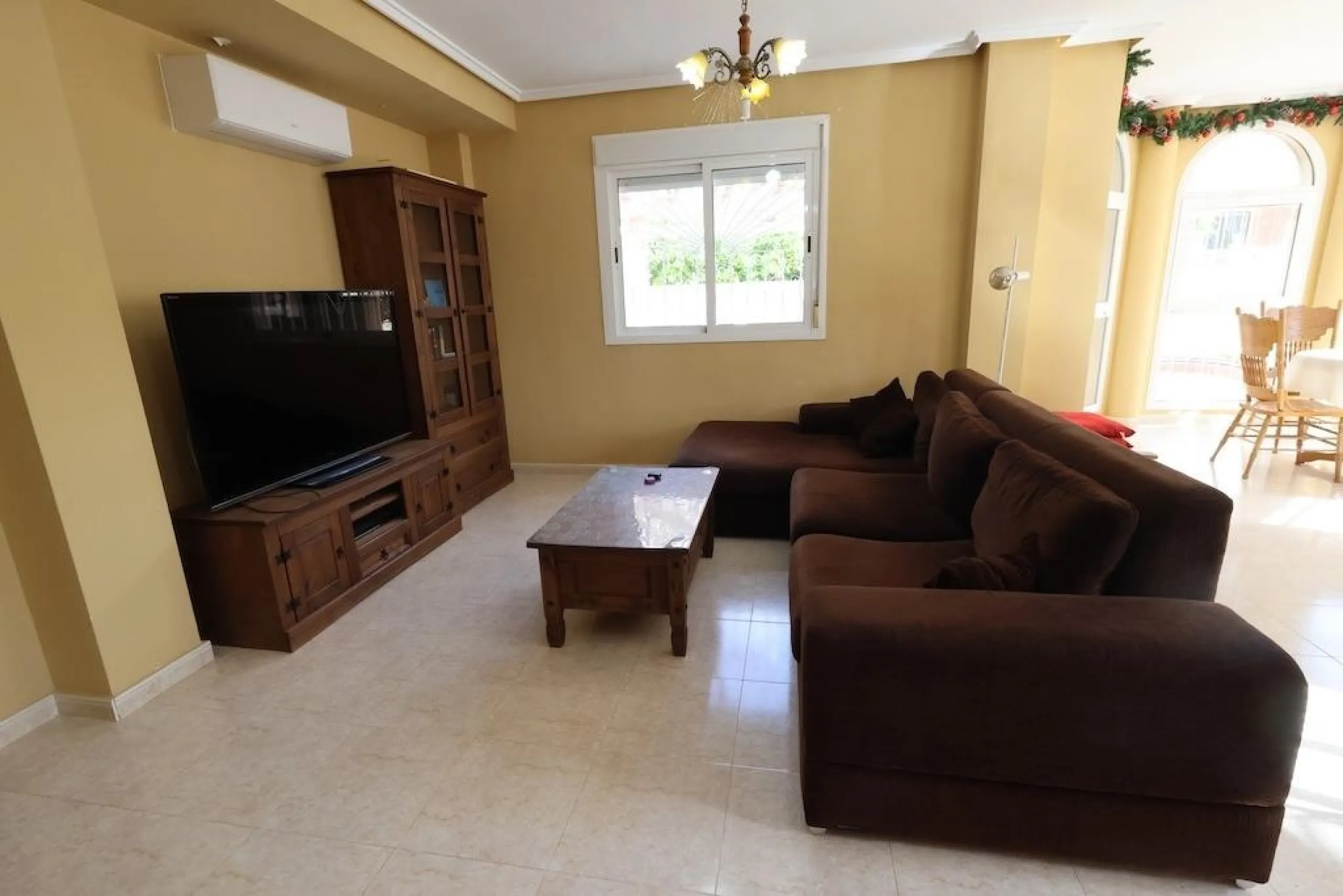 Ciudad Quesada, Residencial Elena – Corner townhouse directly facing the communal pool.