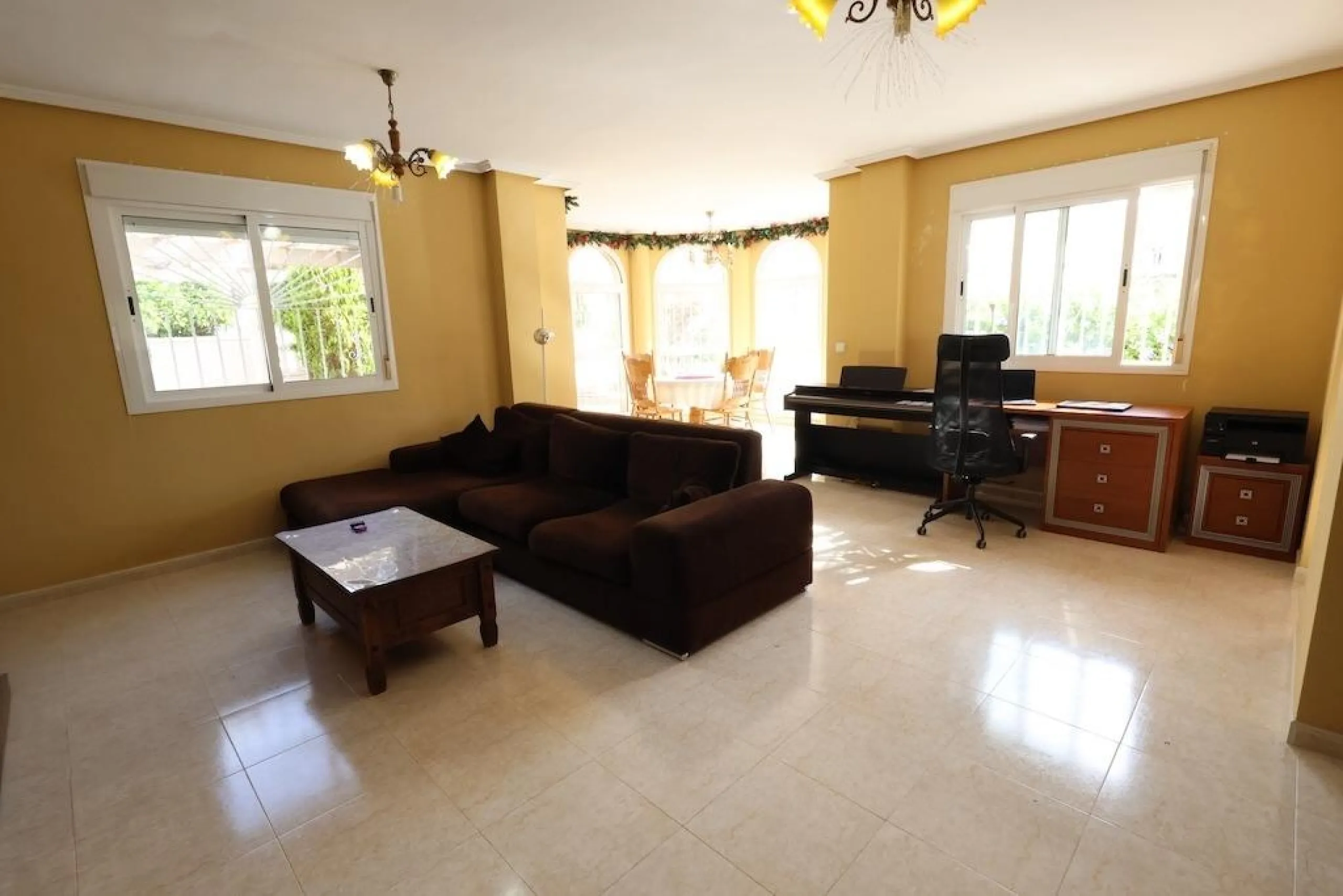 Ciudad Quesada, Residencial Elena – Corner townhouse directly facing the communal pool.