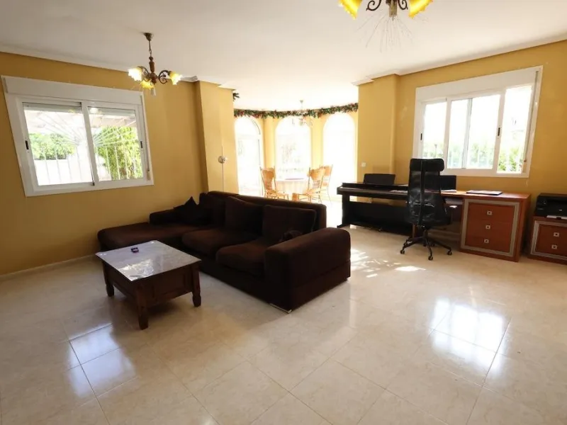 Ciudad Quesada, Residencial Elena – Corner townhouse directly facing the communal pool.