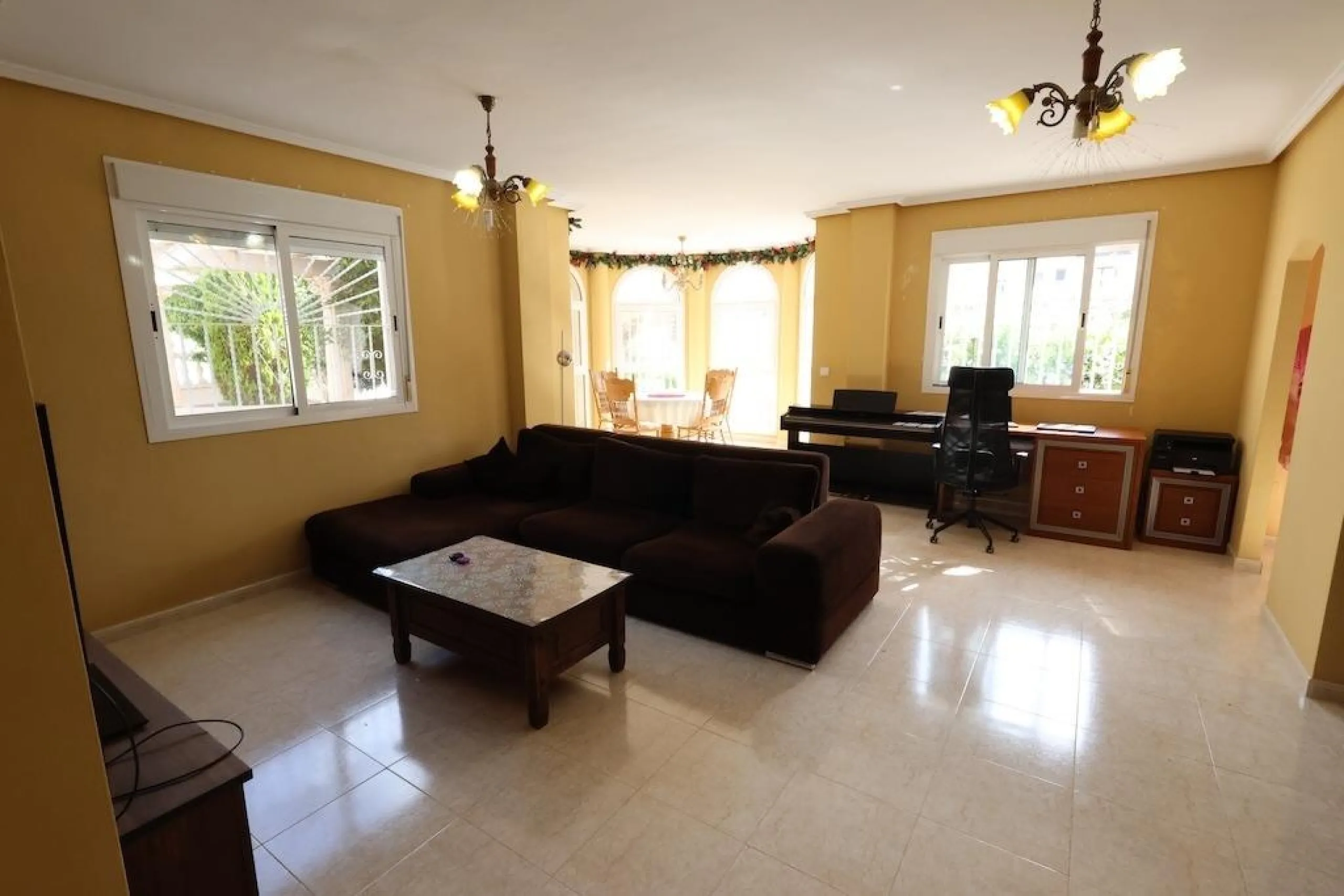 Ciudad Quesada, Residencial Elena – Corner townhouse directly facing the communal pool.