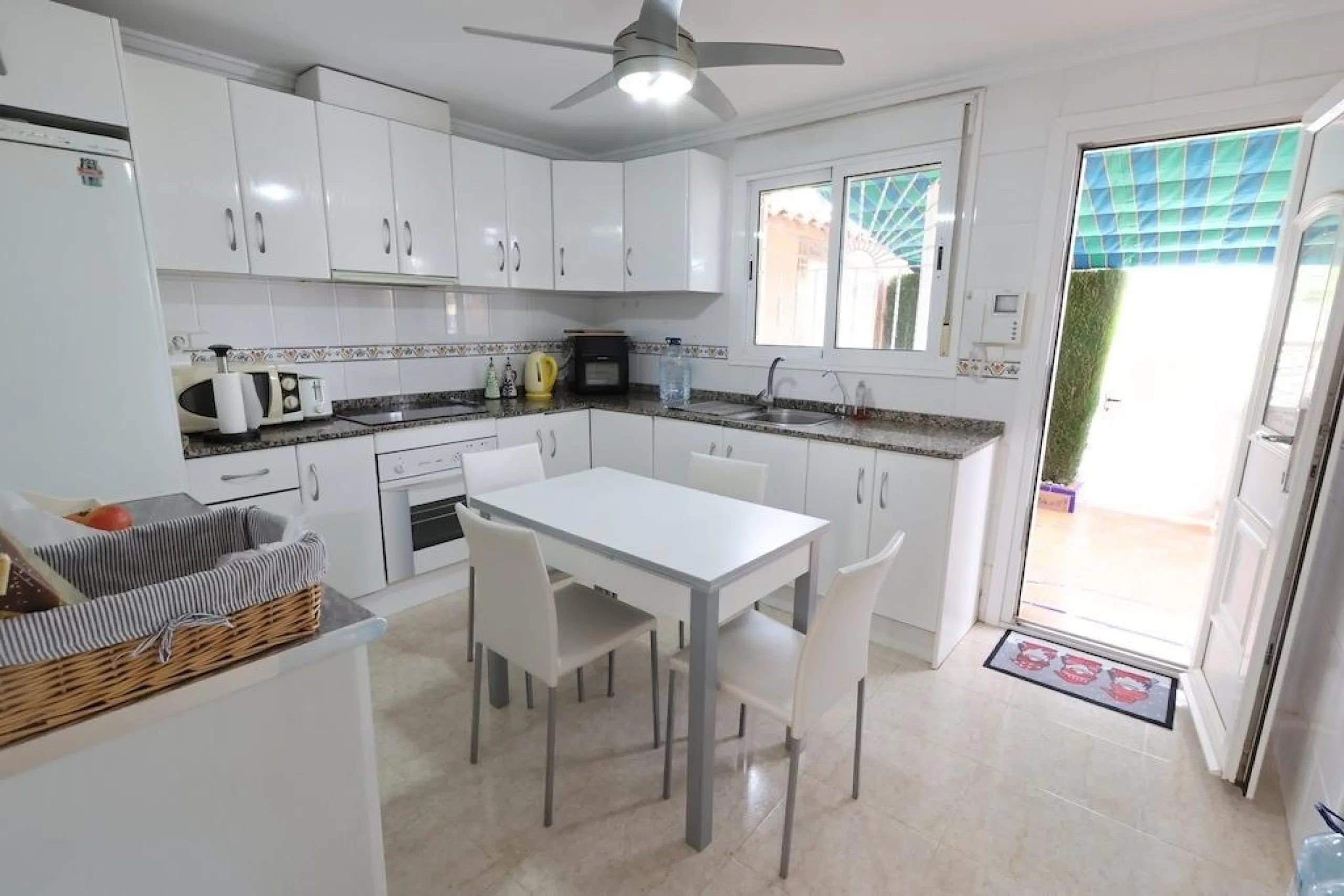 Ciudad Quesada, Residencial Elena – Corner townhouse directly facing the communal pool.