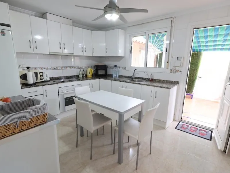 Ciudad Quesada, Residencial Elena – Corner townhouse directly facing the communal pool.