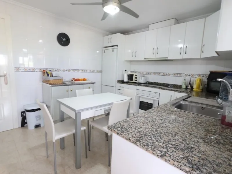 Ciudad Quesada, Residencial Elena – Corner townhouse directly facing the communal pool.