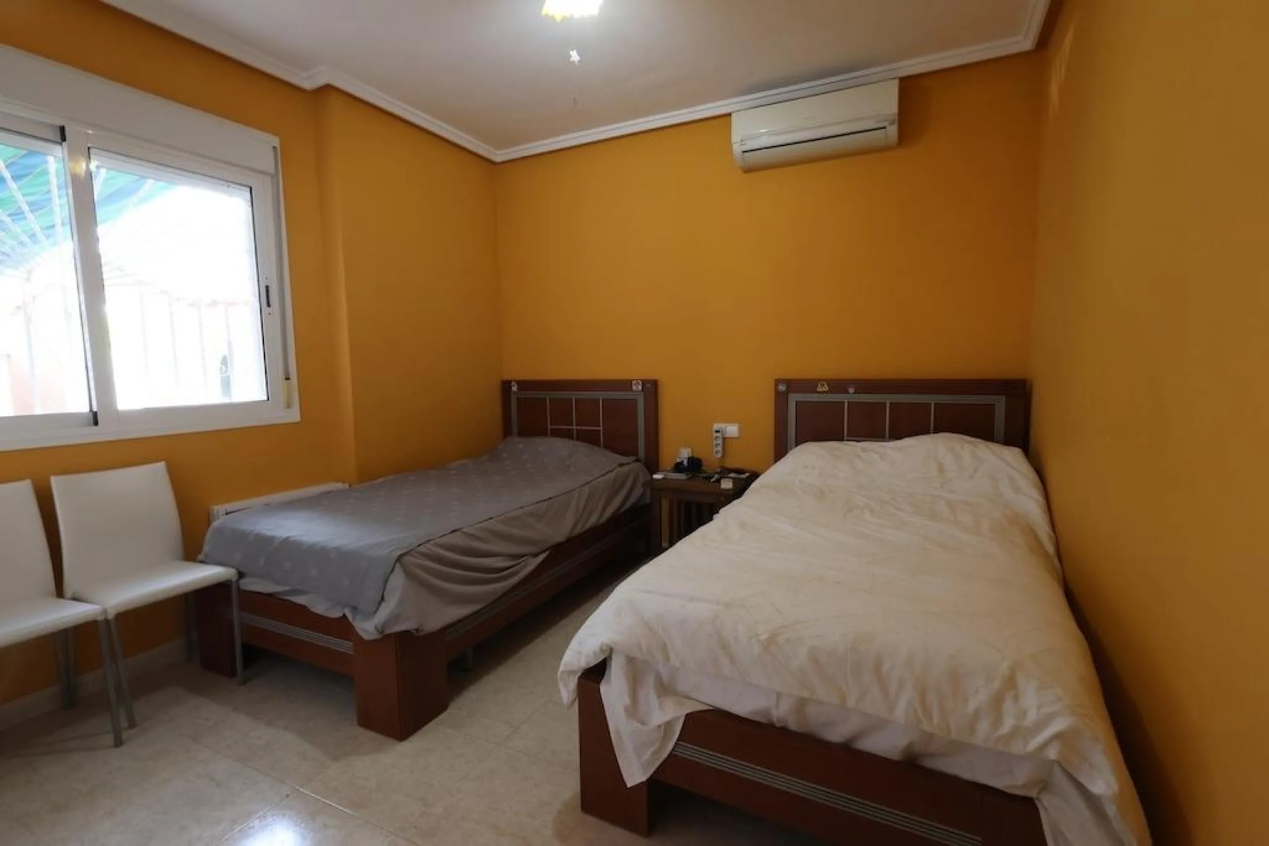 Ciudad Quesada, Residencial Elena – Corner townhouse directly facing the communal pool.