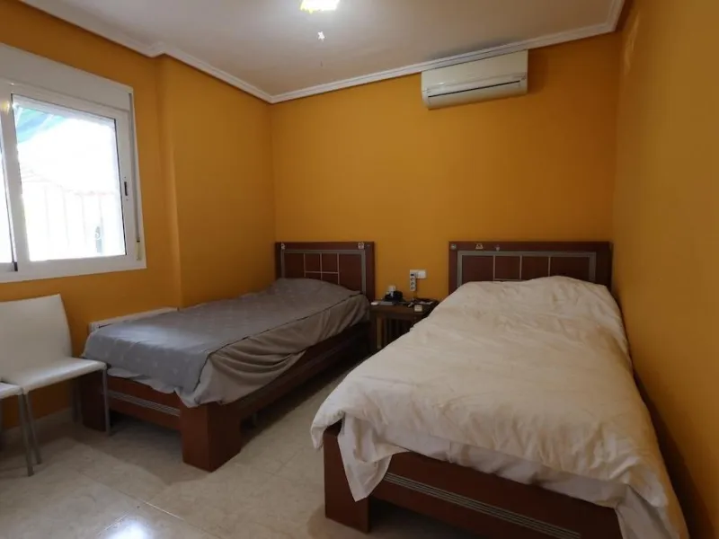 Ciudad Quesada, Residencial Elena – Corner townhouse directly facing the communal pool.