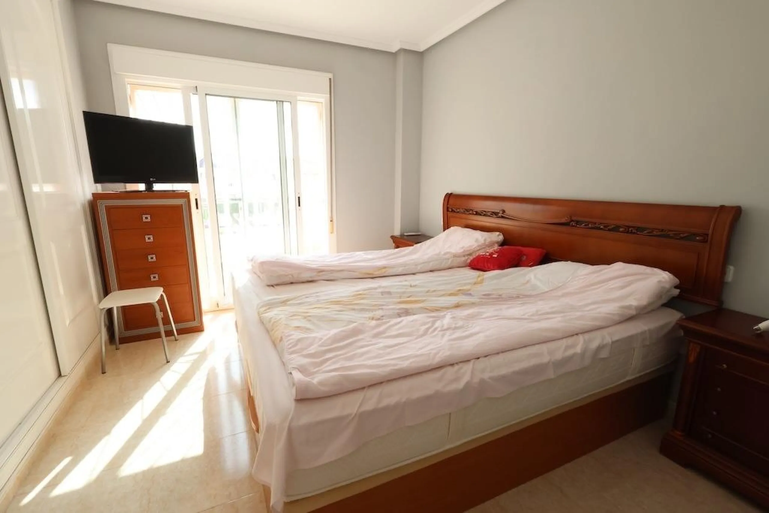 Ciudad Quesada, Residencial Elena – Corner townhouse directly facing the communal pool.