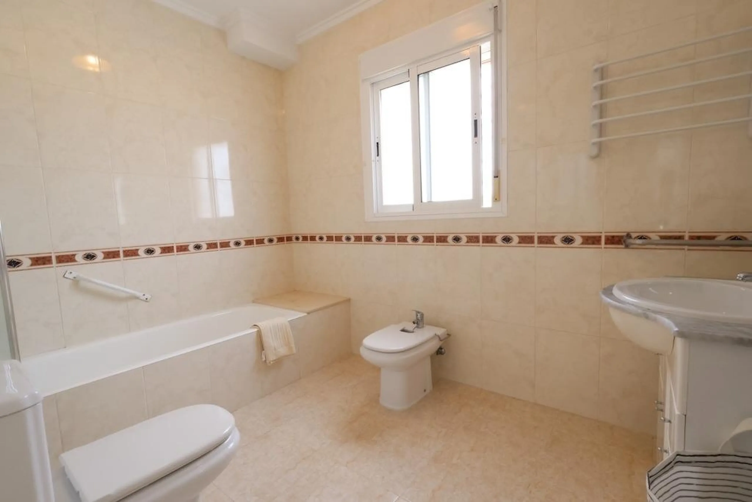 Ciudad Quesada, Residencial Elena – Corner townhouse directly facing the communal pool.