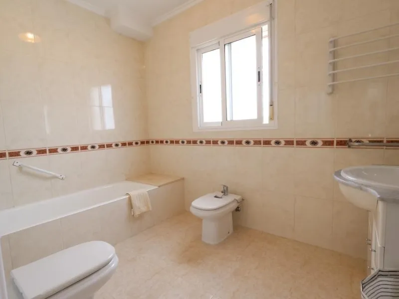 Ciudad Quesada, Residencial Elena – Corner townhouse directly facing the communal pool.