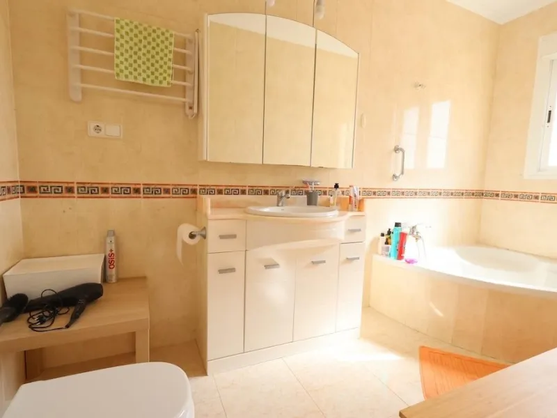 Ciudad Quesada, Residencial Elena – Corner townhouse directly facing the communal pool.