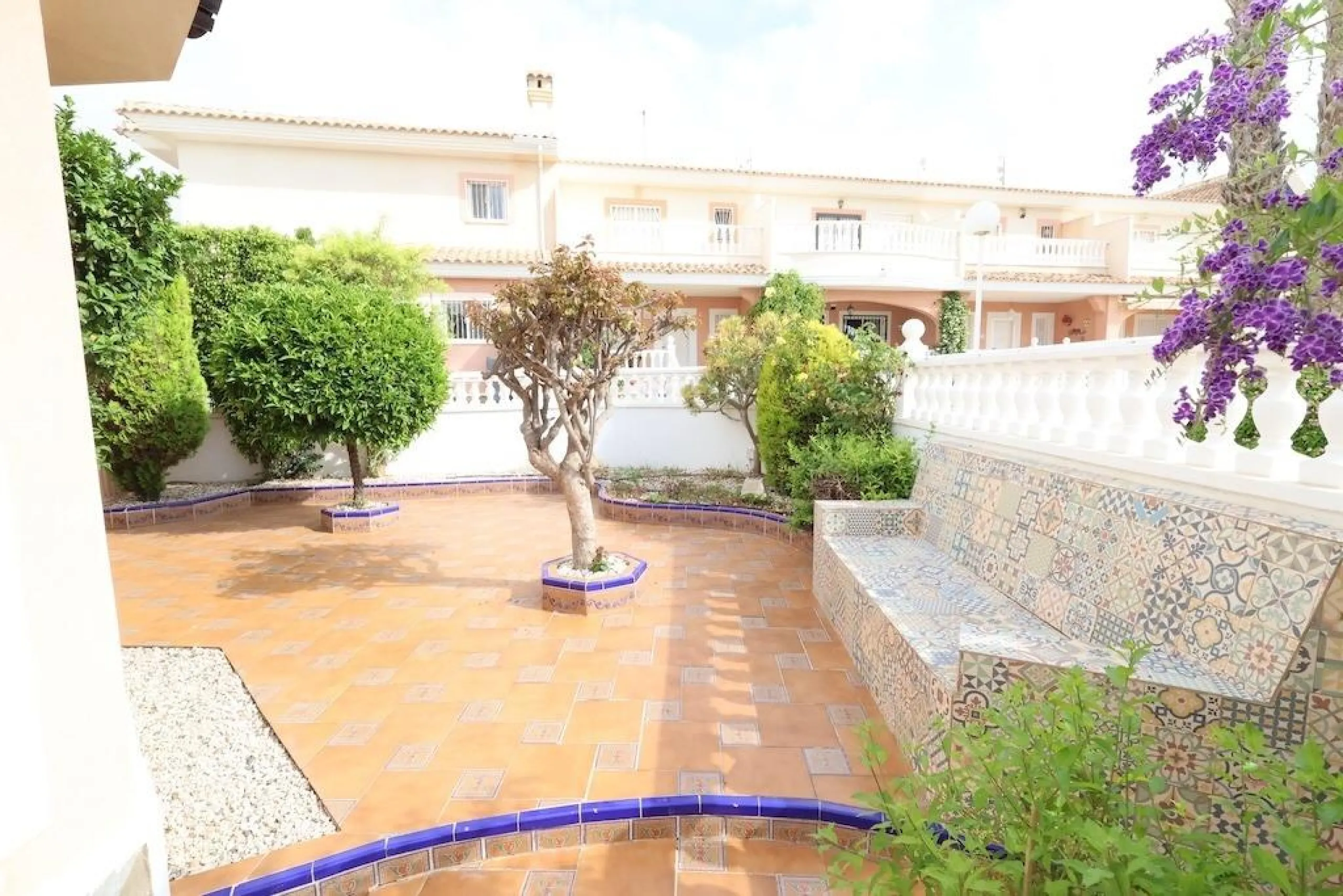 Ciudad Quesada, Residencial Elena – Corner townhouse directly facing the communal pool.
