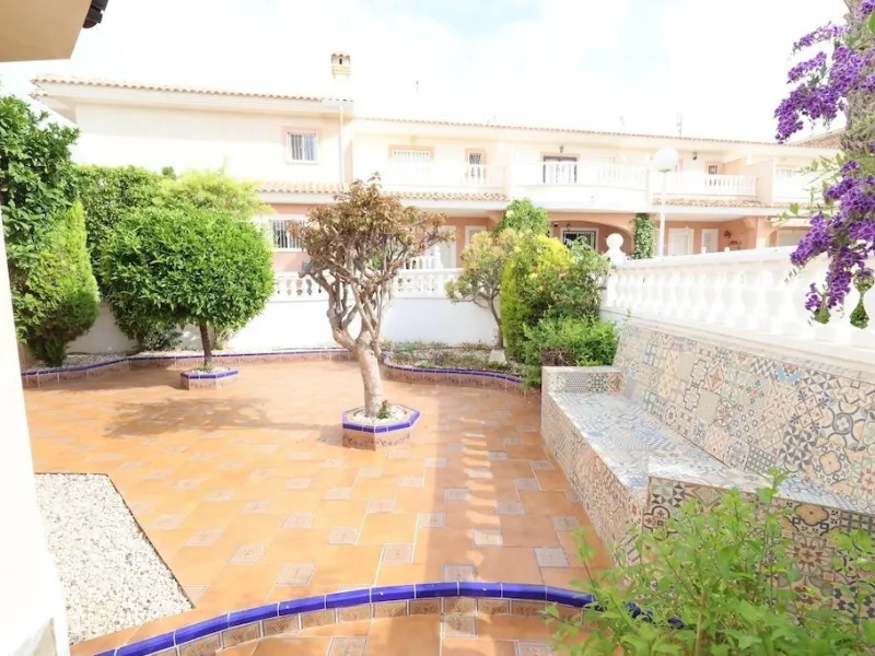 Ciudad Quesada, Residencial Elena – Corner townhouse directly facing the communal pool.
