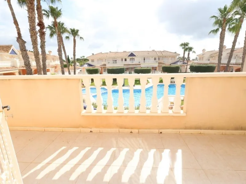 Ciudad Quesada, Residencial Elena – Corner townhouse directly facing the communal pool.