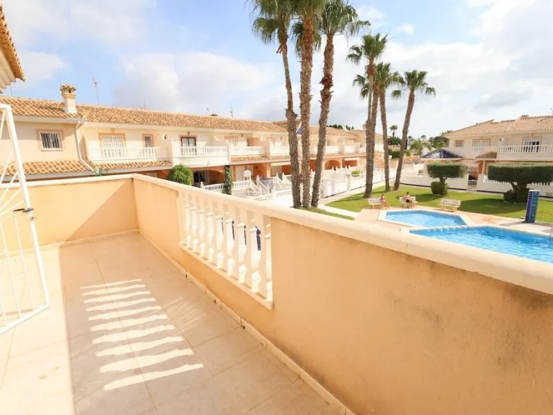 Ciudad Quesada, Residencial Elena – Corner townhouse directly facing the communal pool.