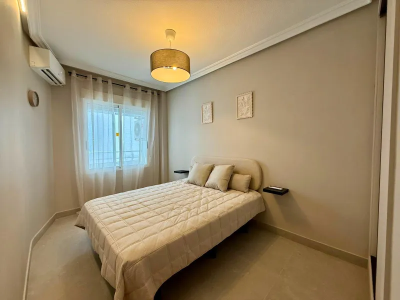 Exclusive renovated apartment with side sea views and two terraces