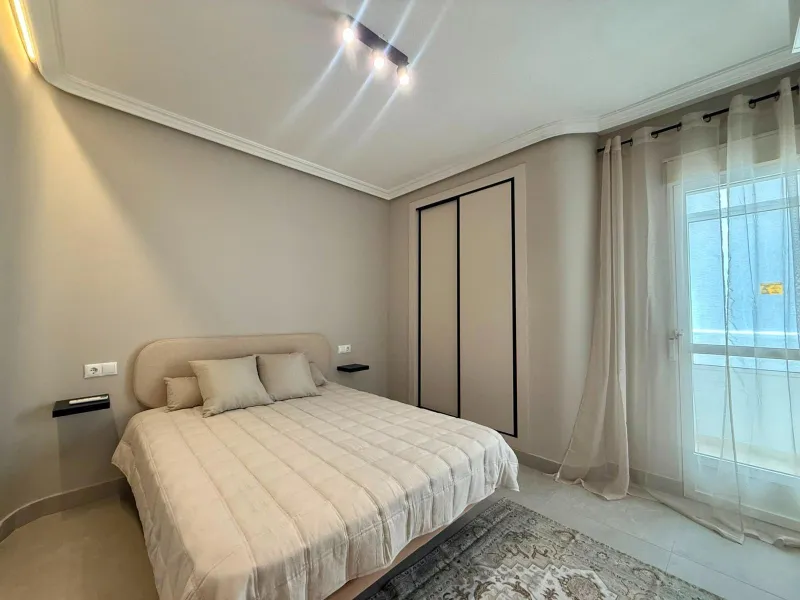 Exclusive renovated apartment with side sea views and two terraces