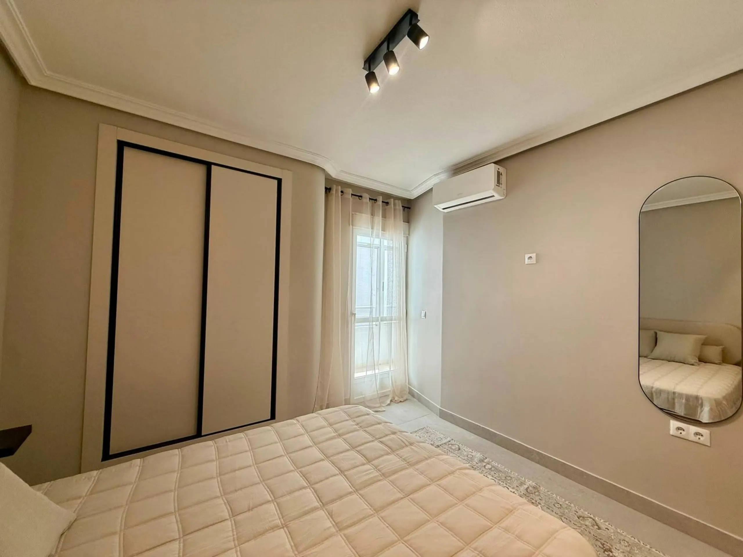 Exclusive renovated apartment with side sea views and two terraces