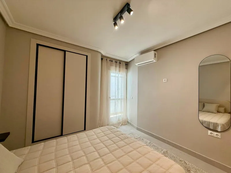 Exclusive renovated apartment with side sea views and two terraces