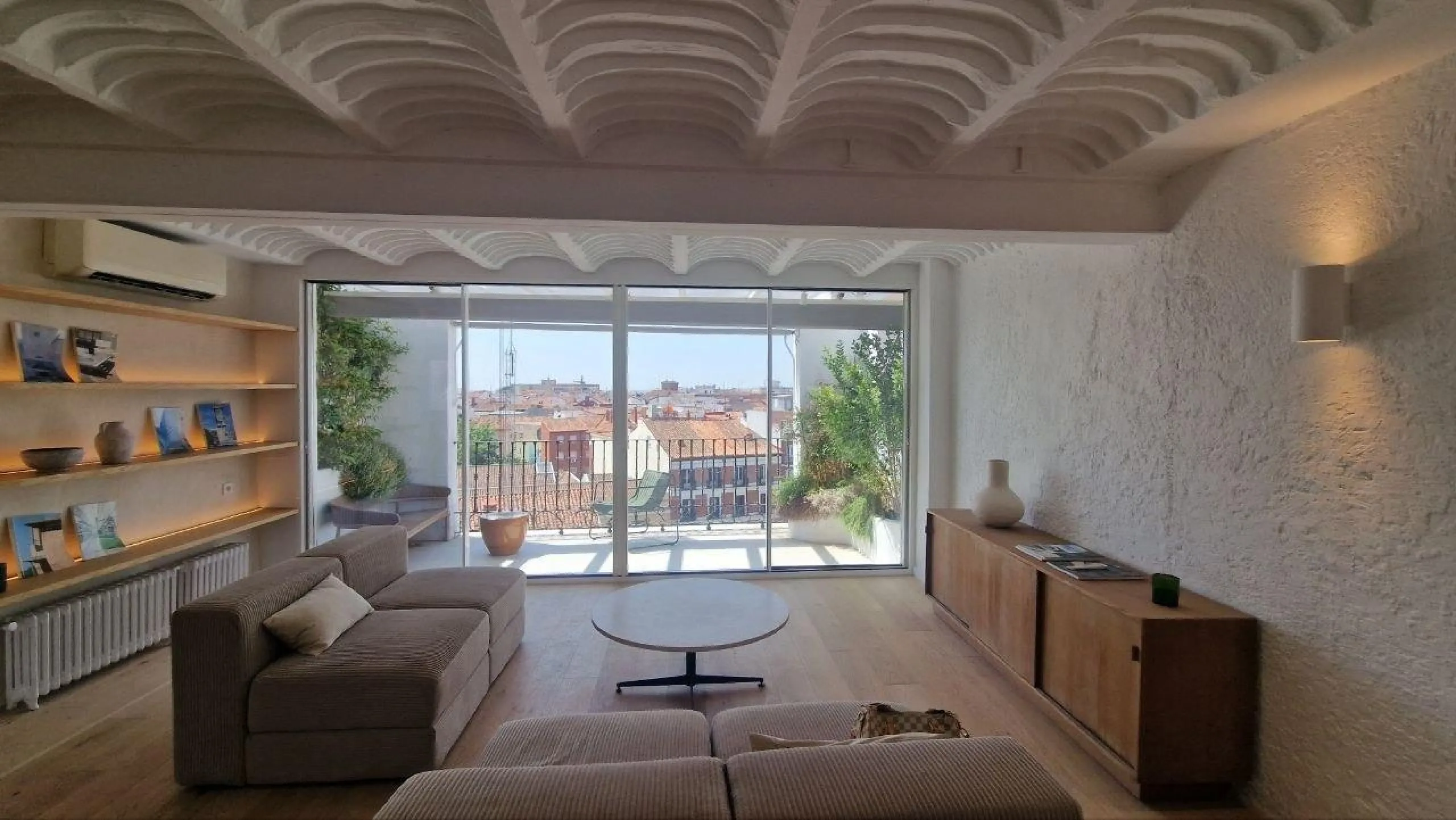 Penthouse with designer renovation and two terraces, in a historic building in the Palacio neighborhood.
