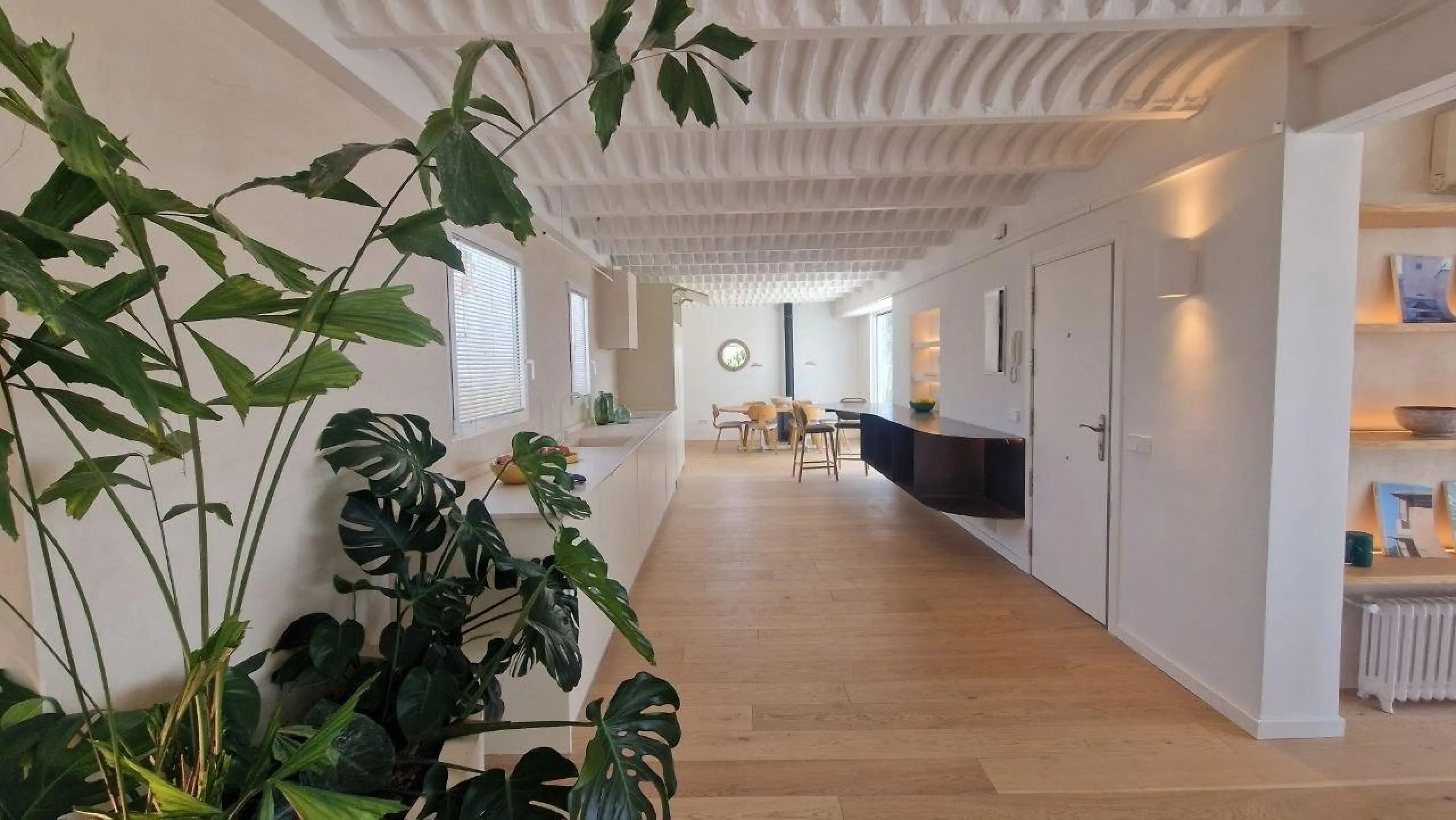 Penthouse with designer renovation and two terraces, in a historic building in the Palacio neighborhood.