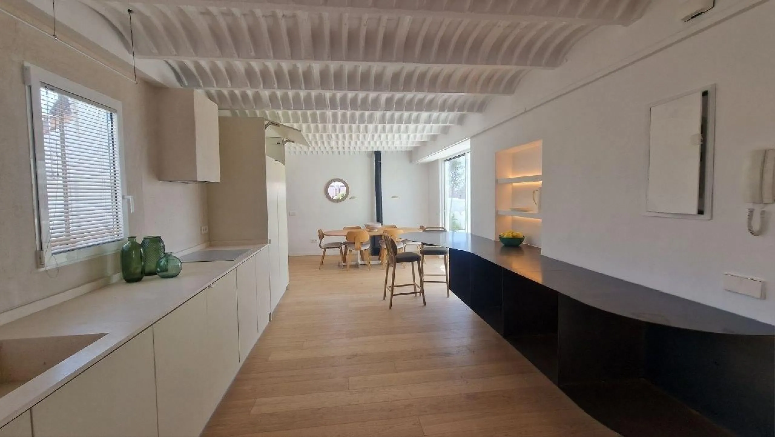 Penthouse with designer renovation and two terraces, in a historic building in the Palacio neighborhood.