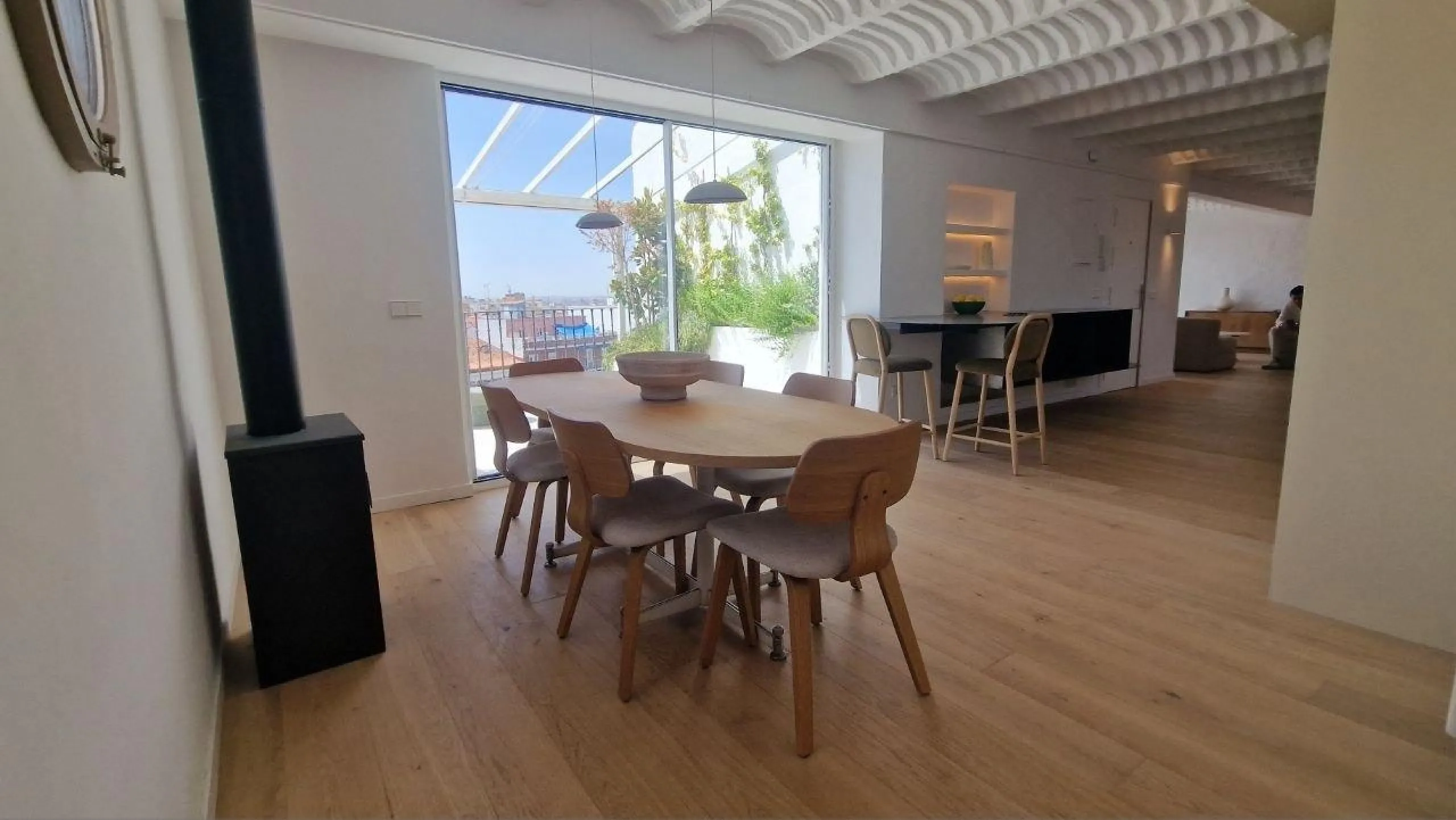 Penthouse with designer renovation and two terraces, in a historic building in the Palacio neighborhood.