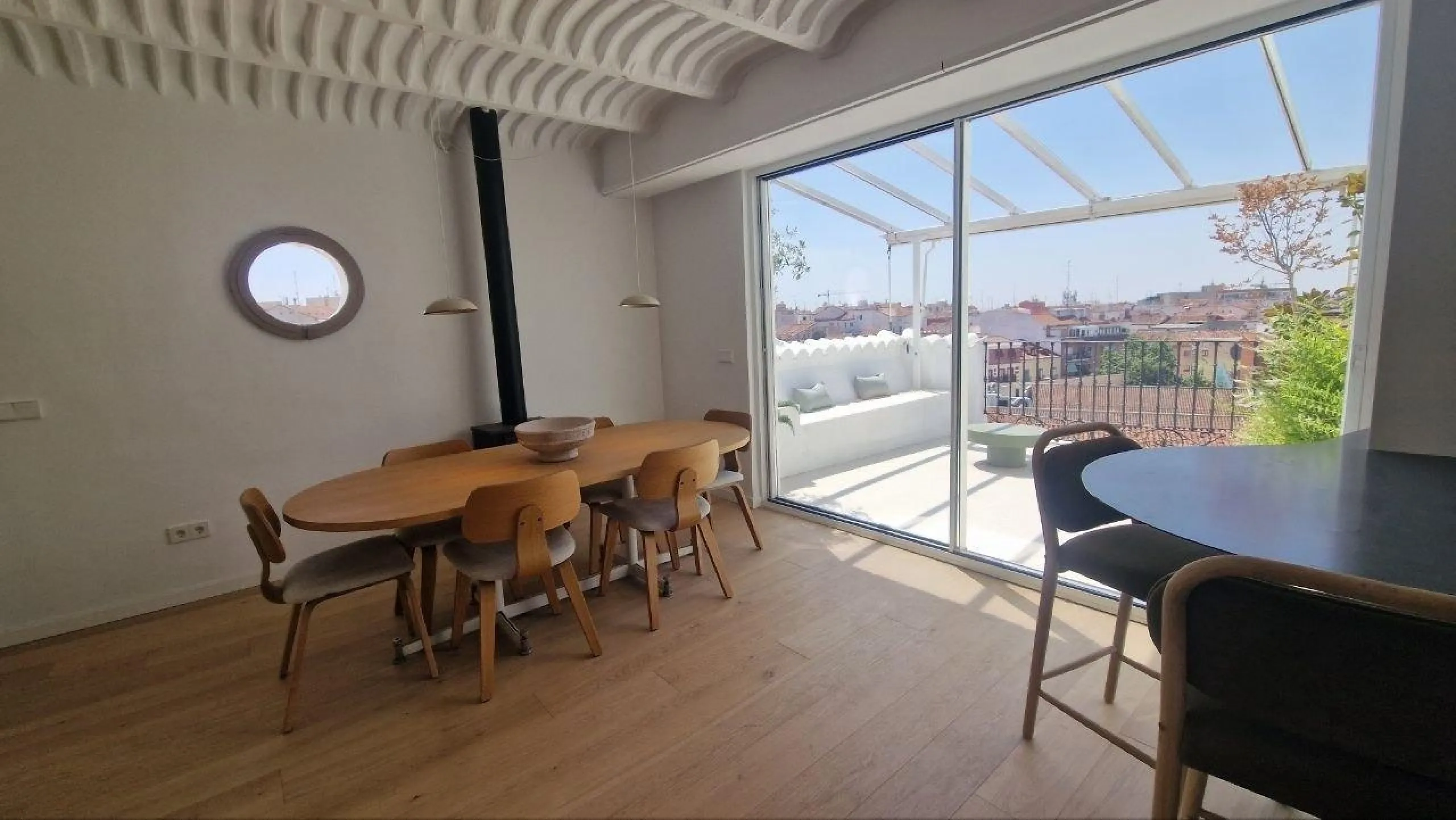 Penthouse with designer renovation and two terraces, in a historic building in the Palacio neighborhood.